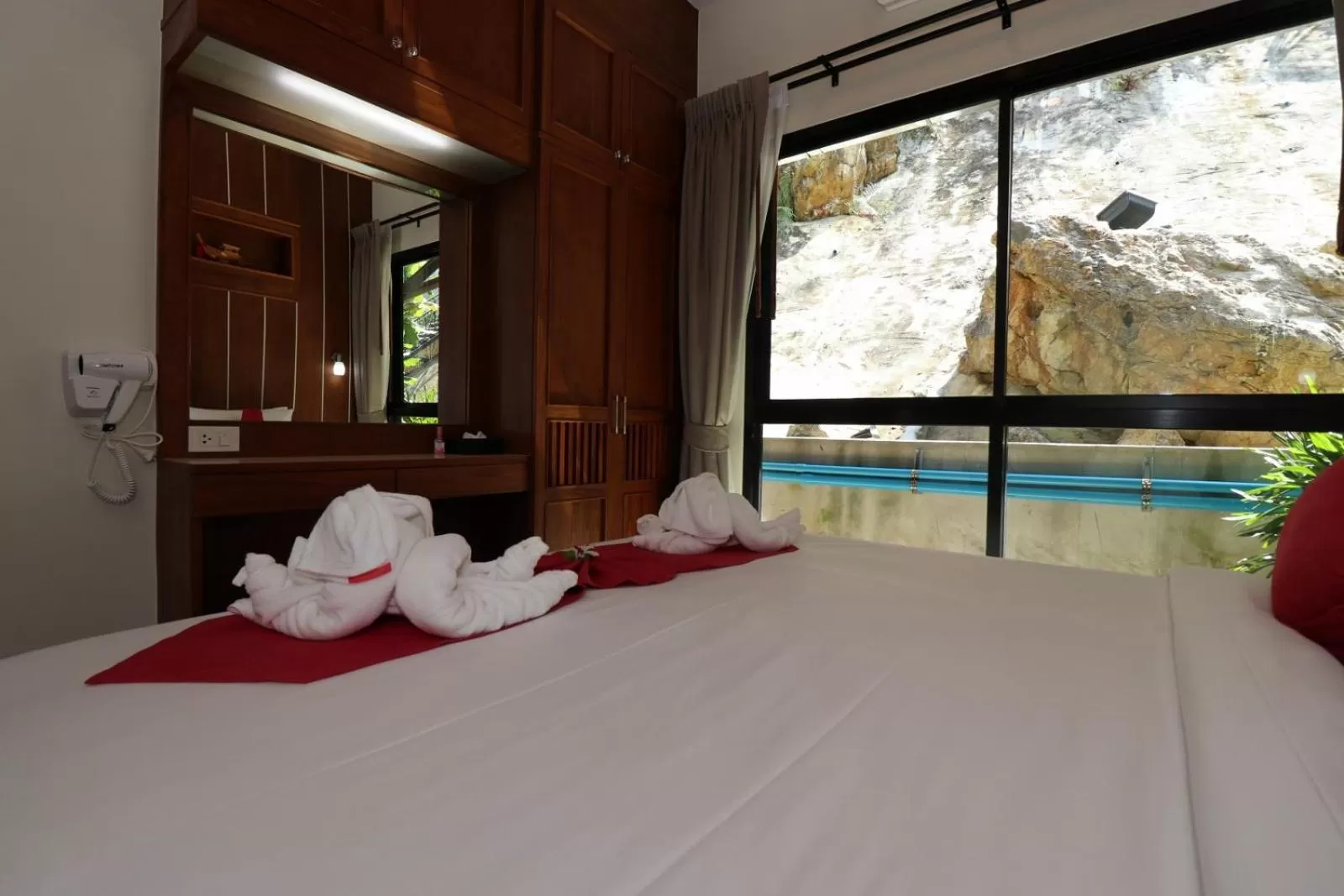 Bed in The Scene Cliff View Villas