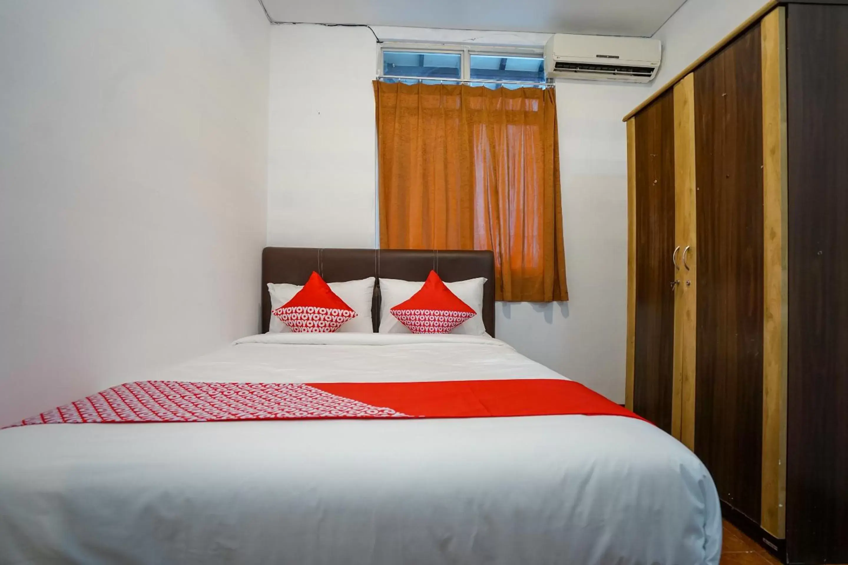 Bedroom, Bed in Super OYO 1844 Bravo Residence