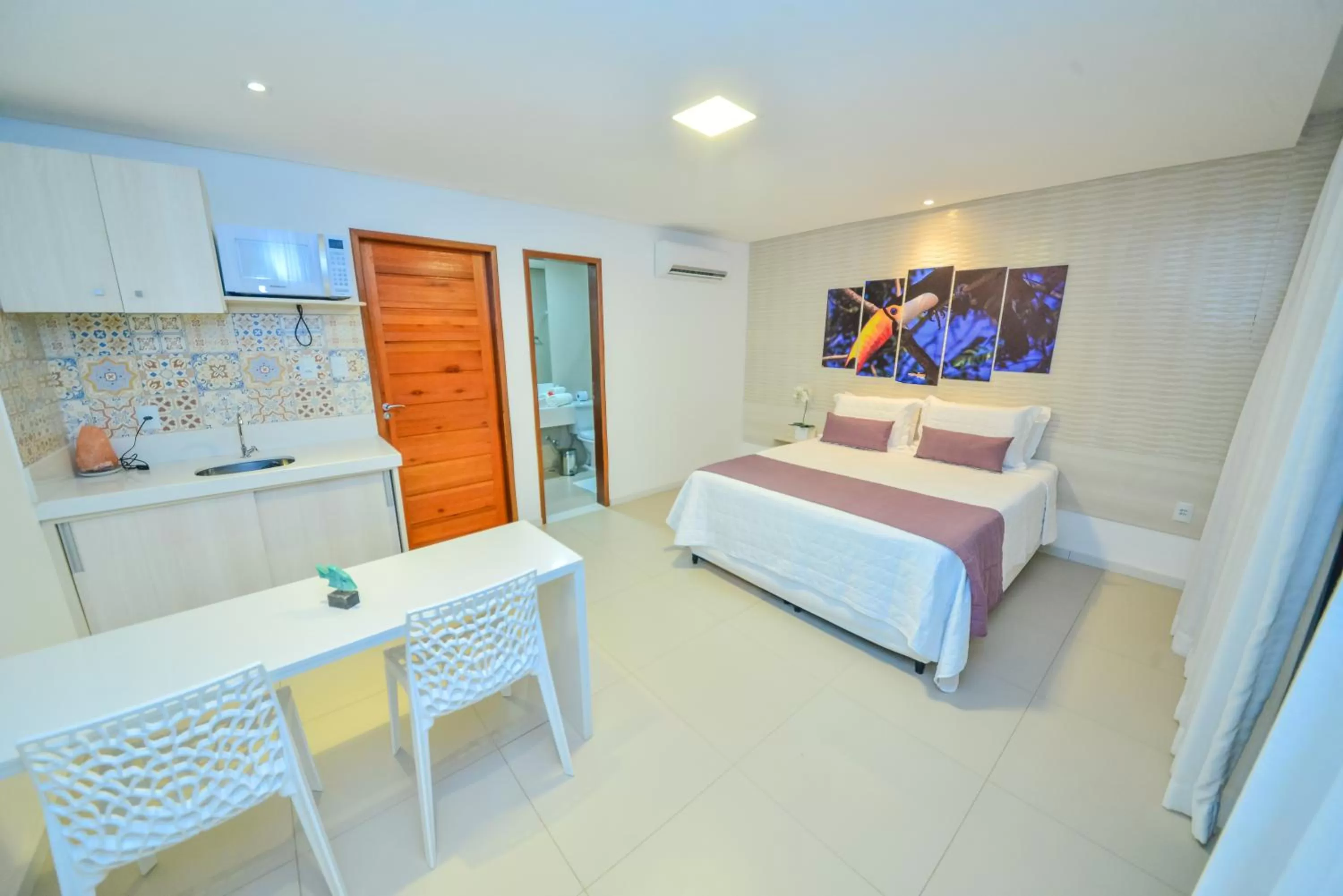 Bed in Pousada Sol e Mar