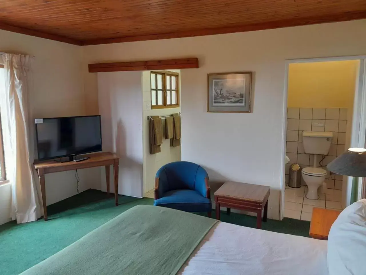 Bedroom, Seating Area in Magoebaskloof Hotel