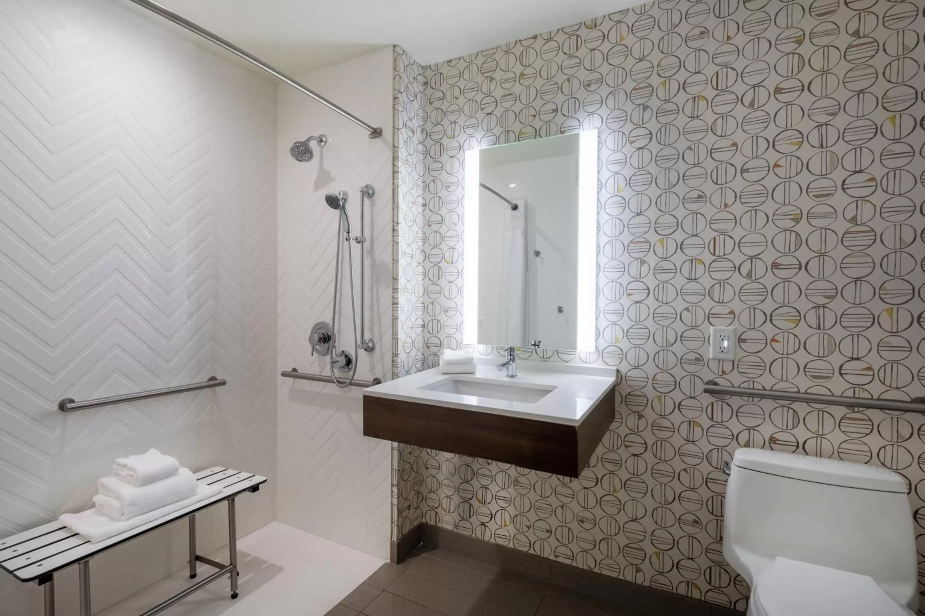 Bathroom in Holiday Inn - Long Island - ISLIP Arpt East, an IHG Hotel