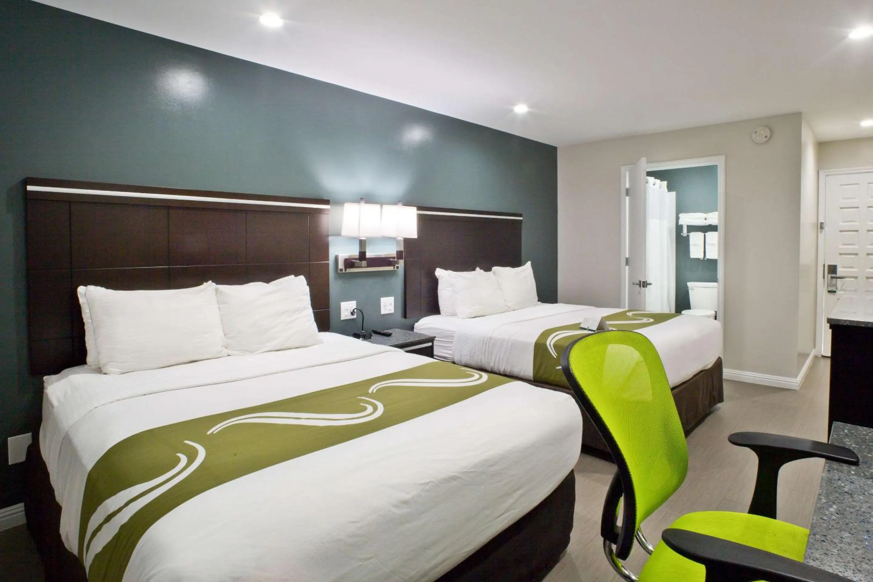 Photo of the whole room, Bed in Bay Area Inn & Suites