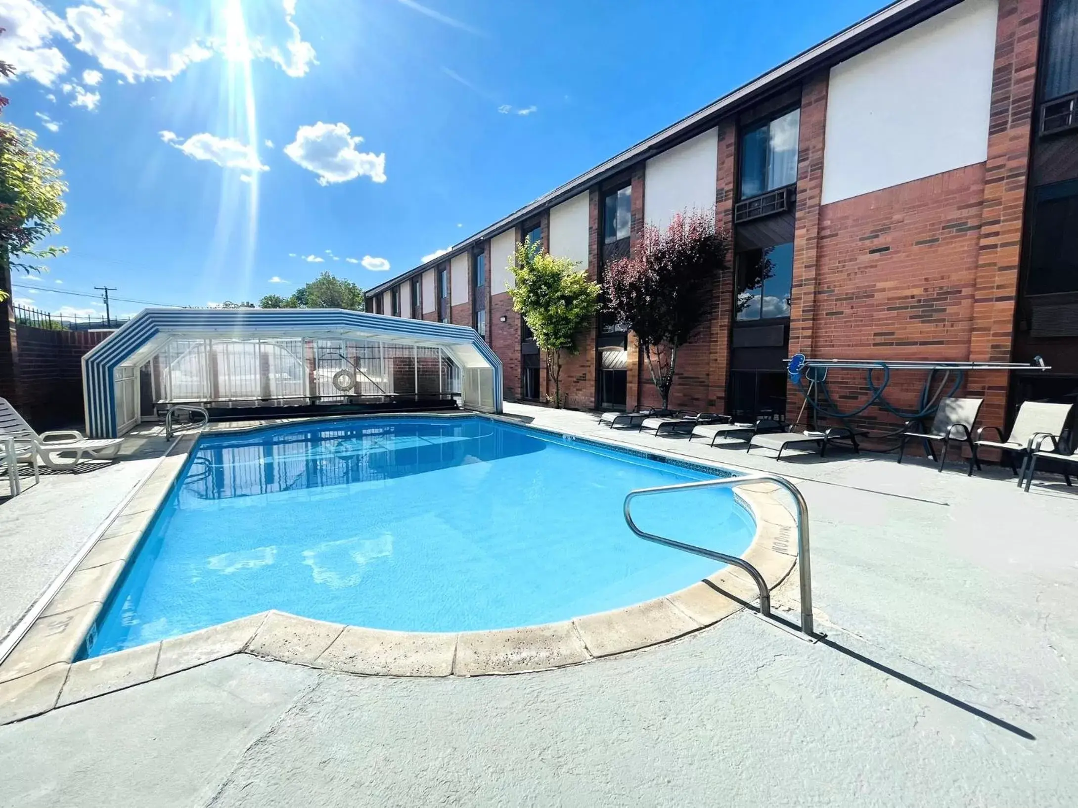 Swimming pool, Property Building in Ramada by Wyndham Richfield UT