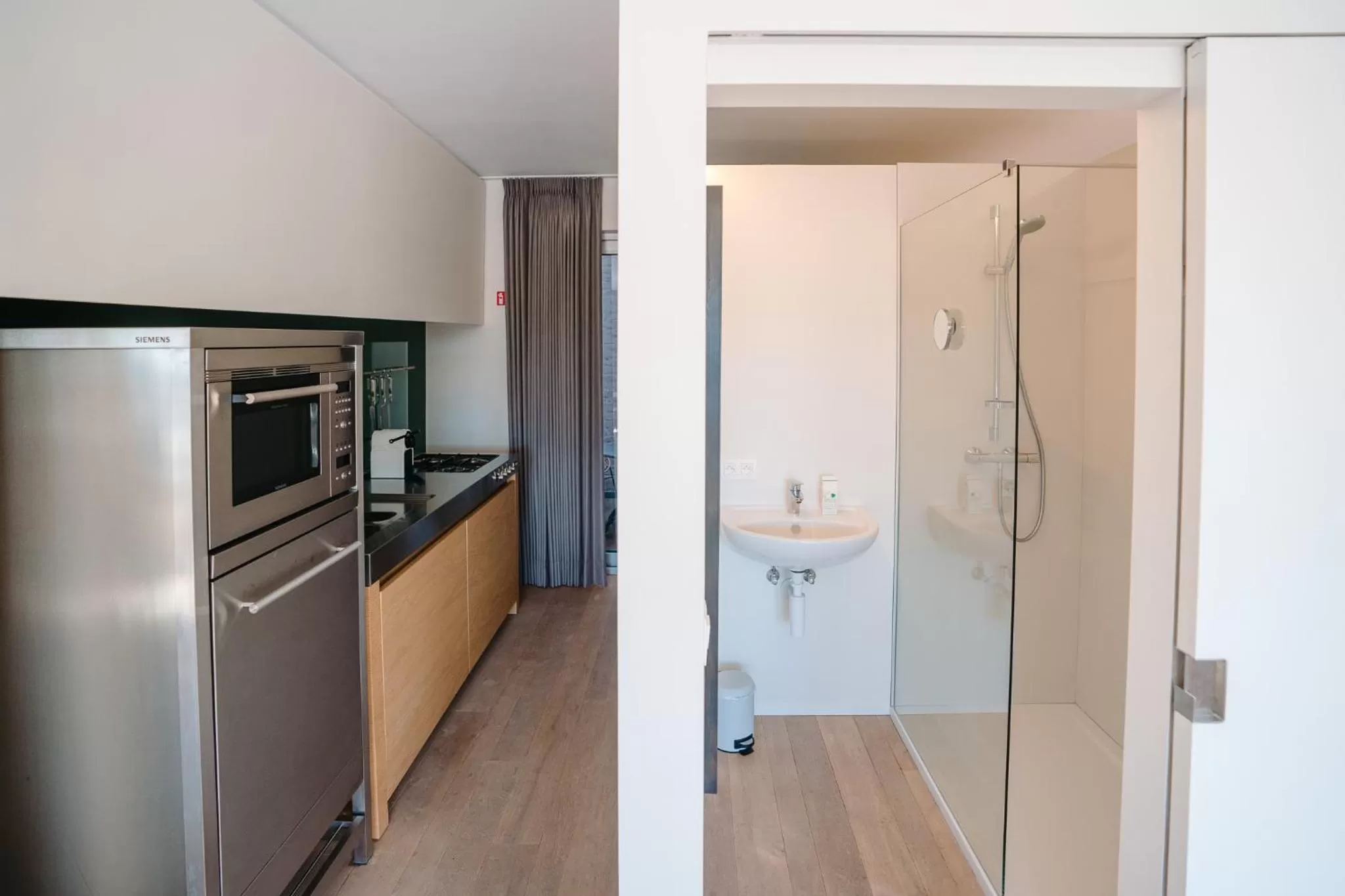 Kitchen or kitchenette in Hotel du Bassin