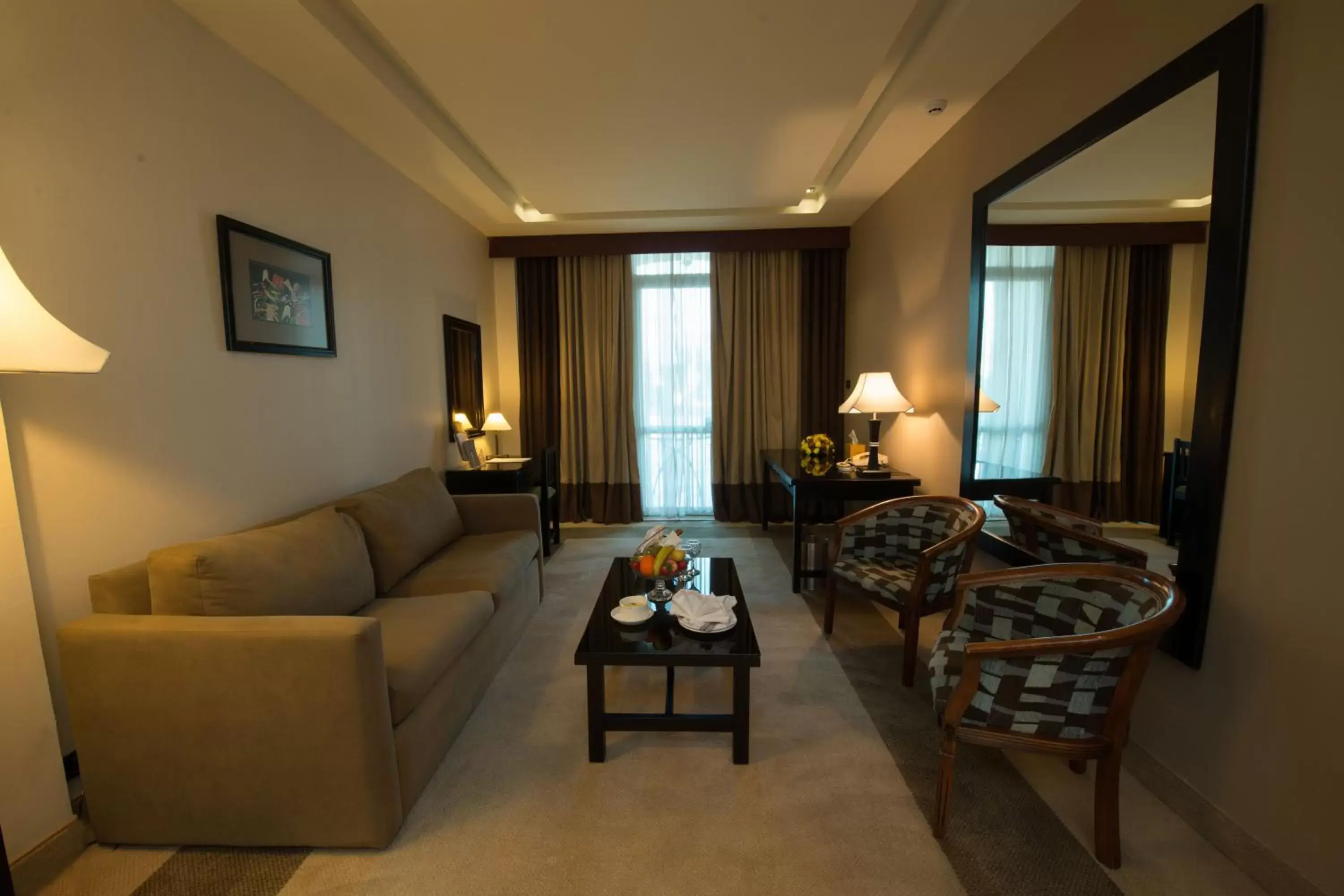 Bedroom, Seating Area in Century Park Hotel