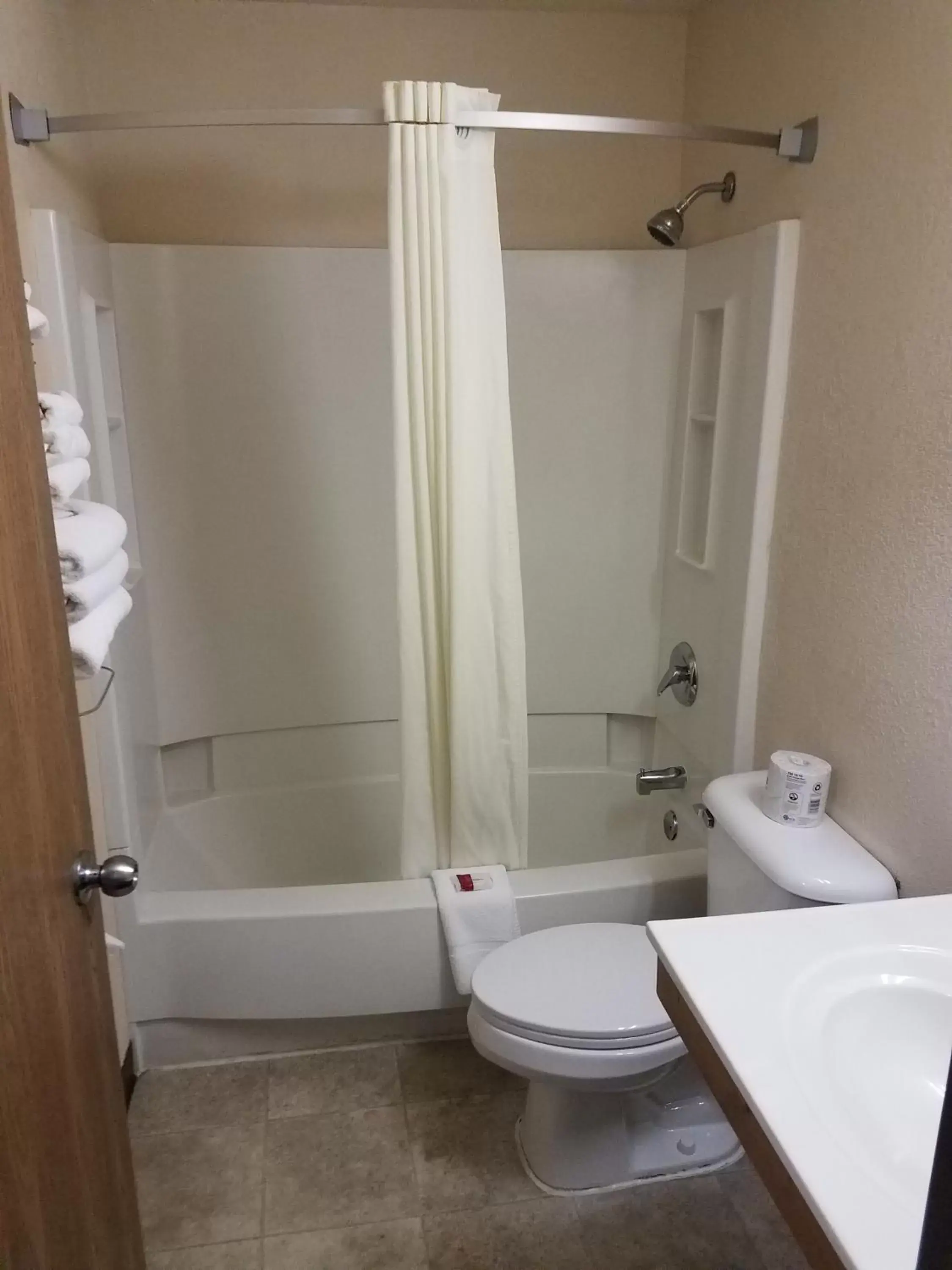 Bathroom in Super 8 by Wyndham Houghton Lake