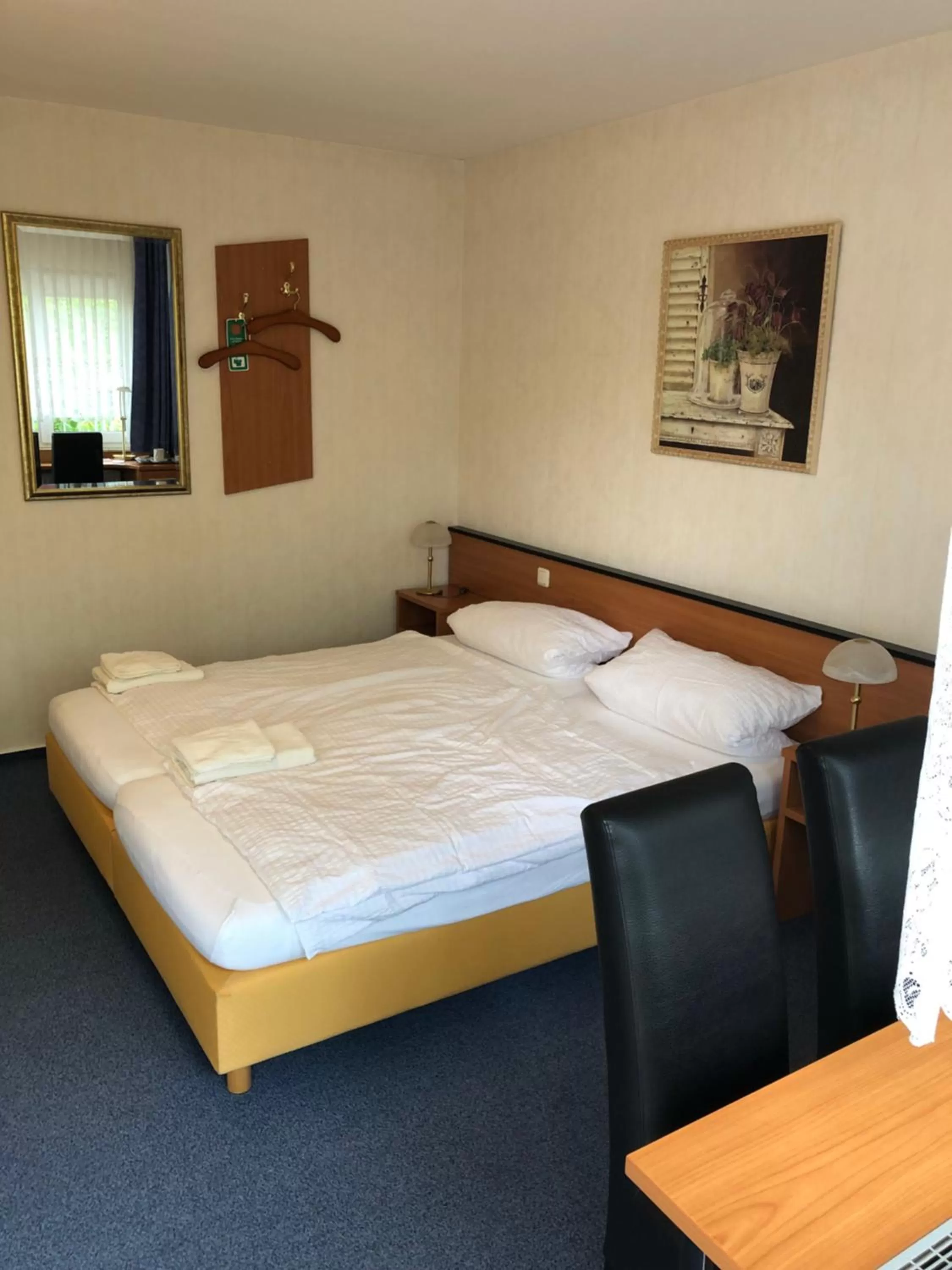 Photo of the whole room, Bed in Gästehaus Am Vogelsang