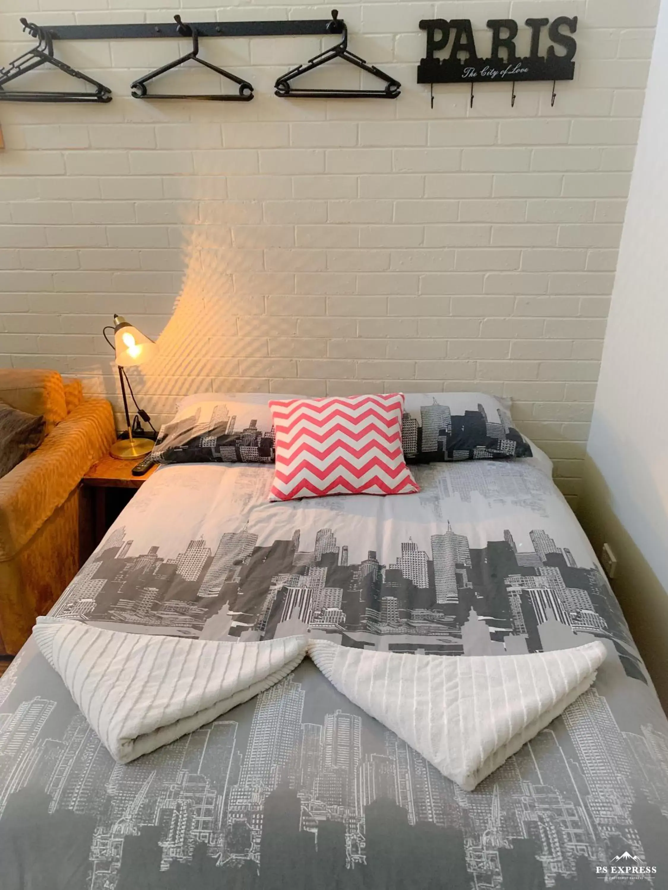 Bed in Westside Studio Apartments