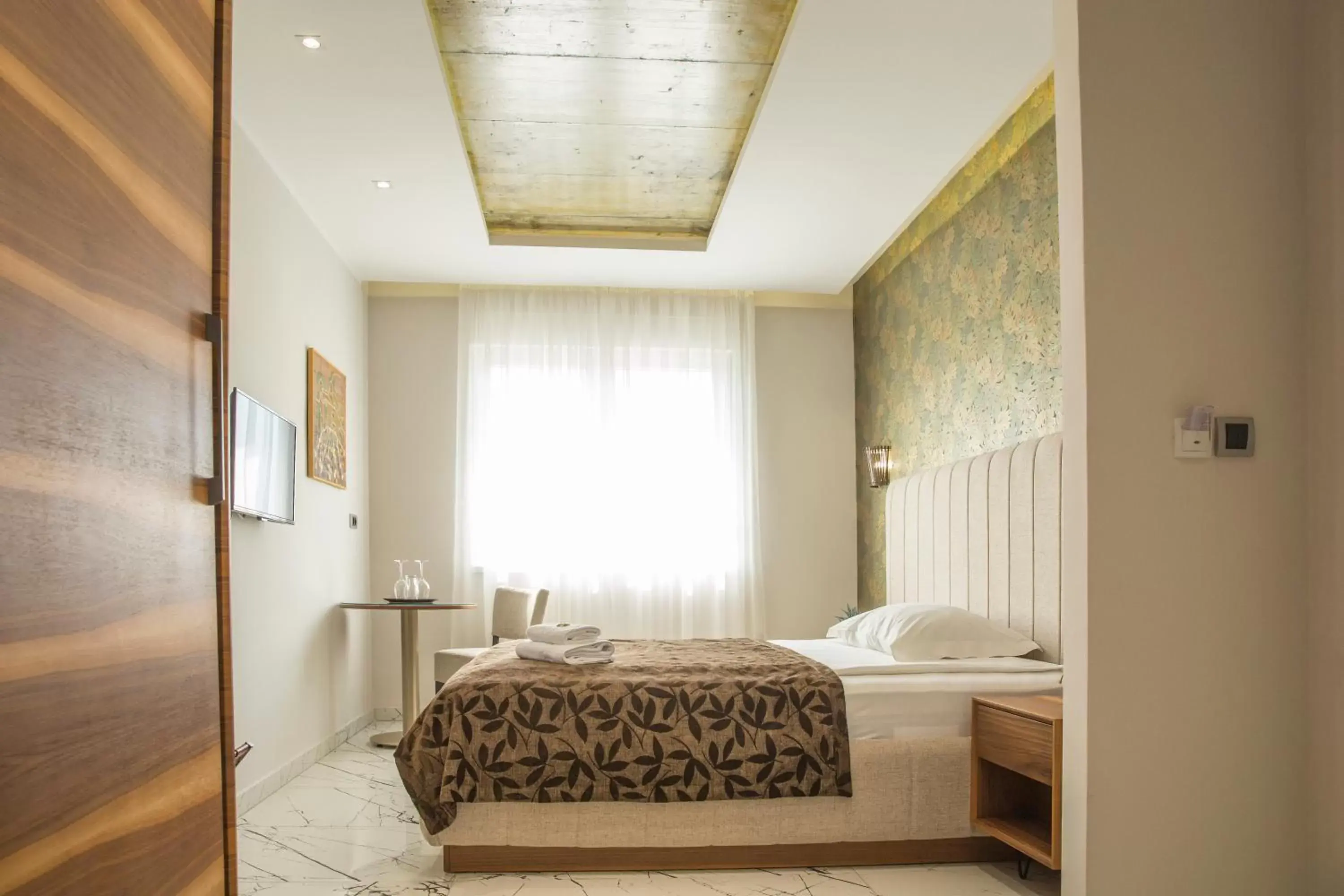 Bed in Garni Boutique Hotel Arta