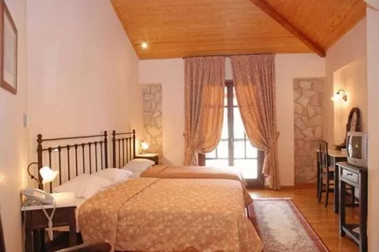Bed in Hotel Kynaitha