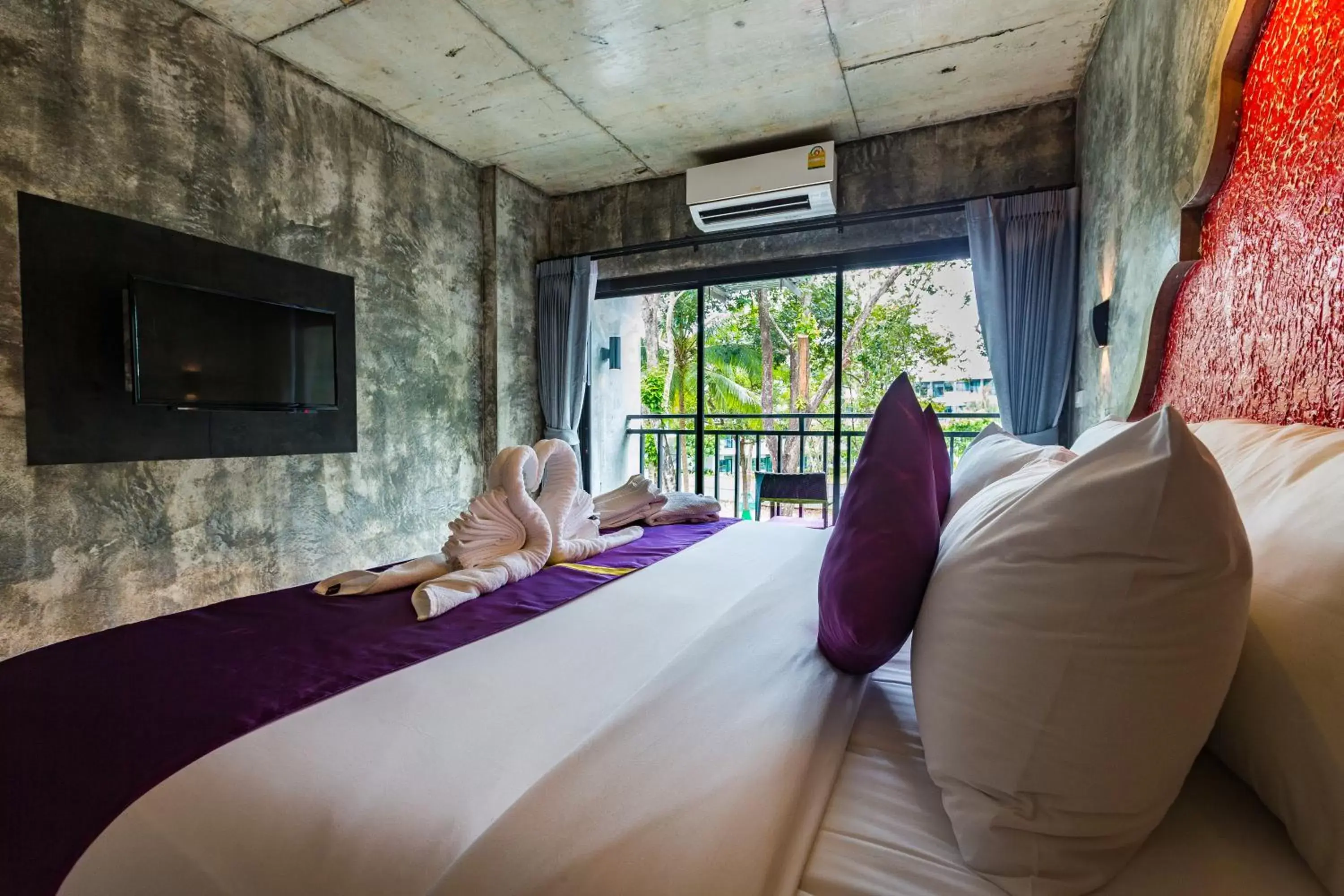 Bed in Maneetel Krabi Beachfront-SHA Plus