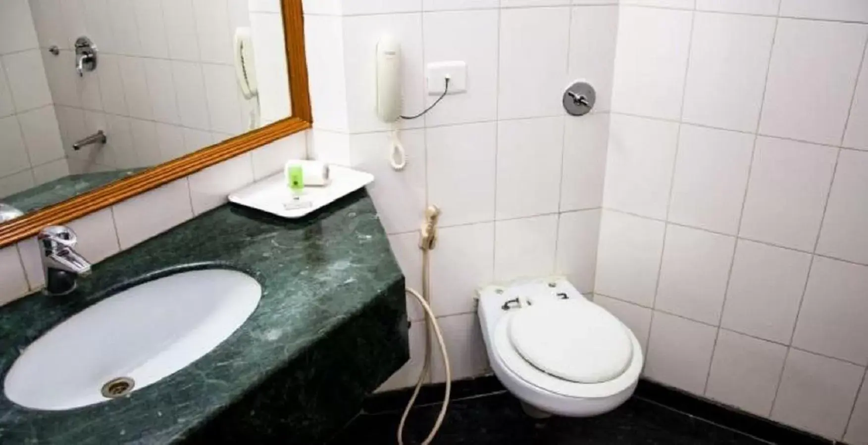 Toilet, Bathroom in Ramee Guestline Tirupati