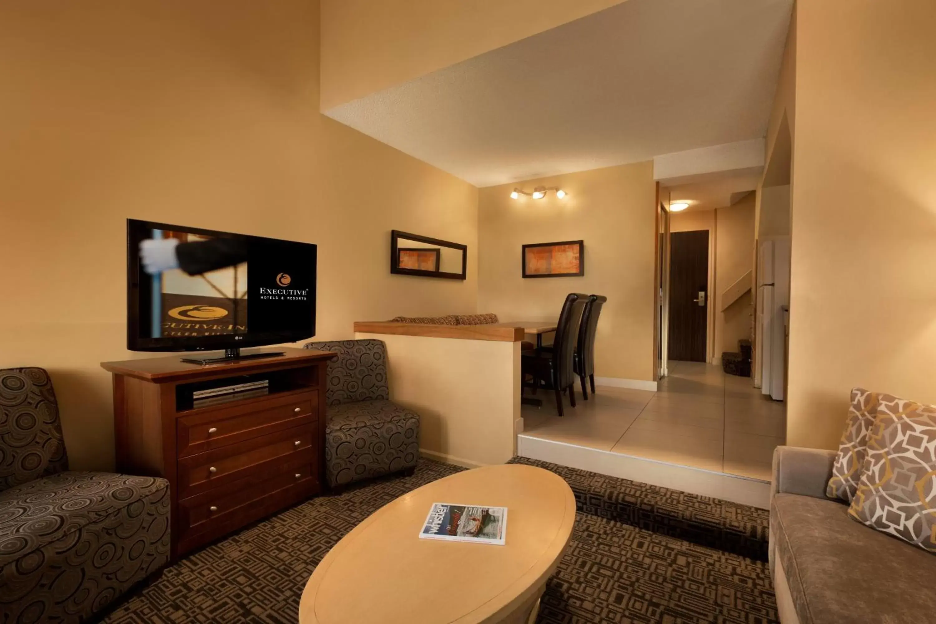 TV/Entertainment Center in Mountain Side Hotel Whistler by Executive