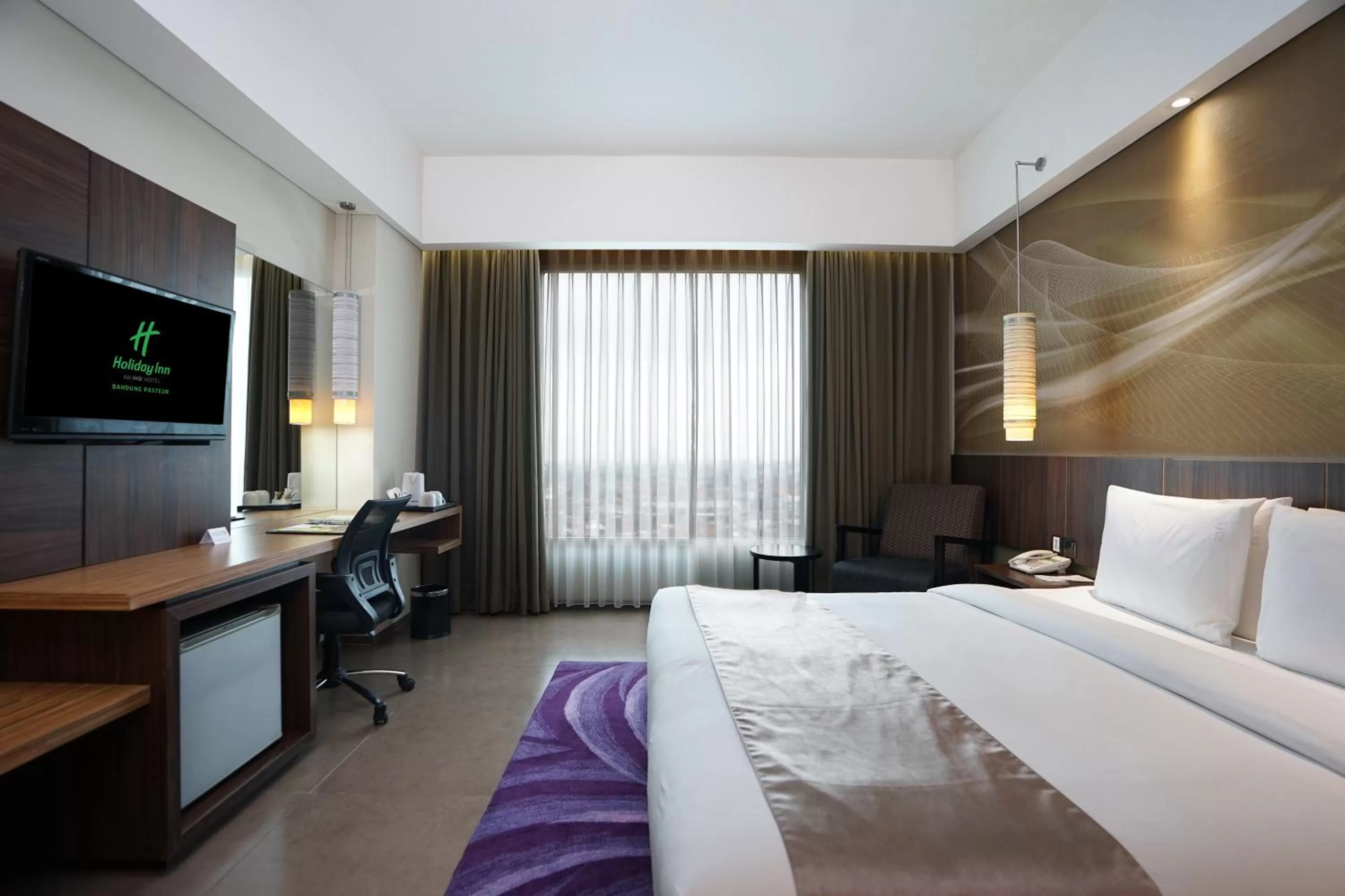 Bed in Holiday Inn Bandung Pasteur by IHG