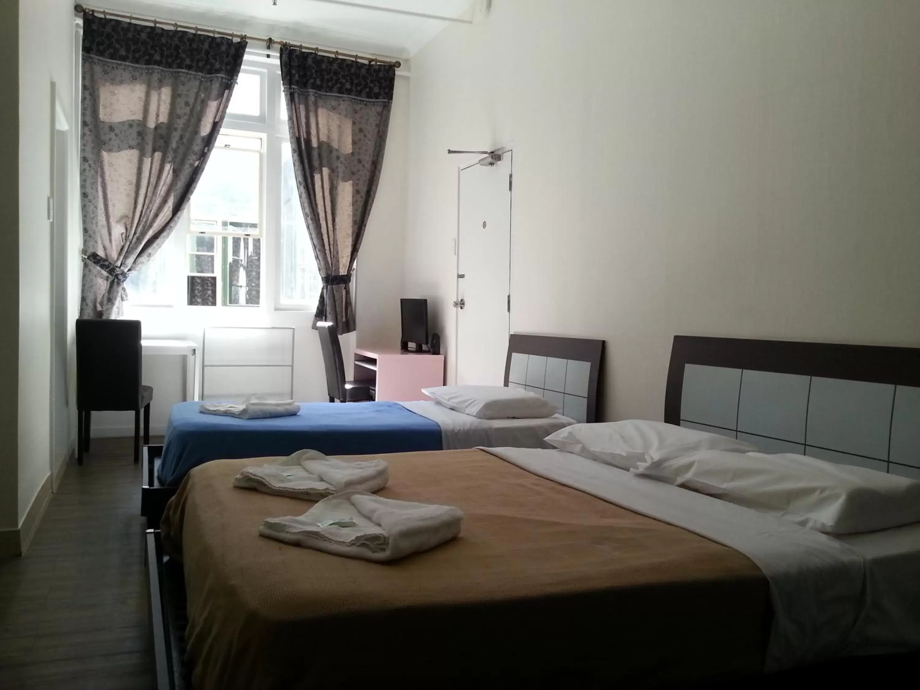Photo of the whole room, Bed in Central Private Hotel