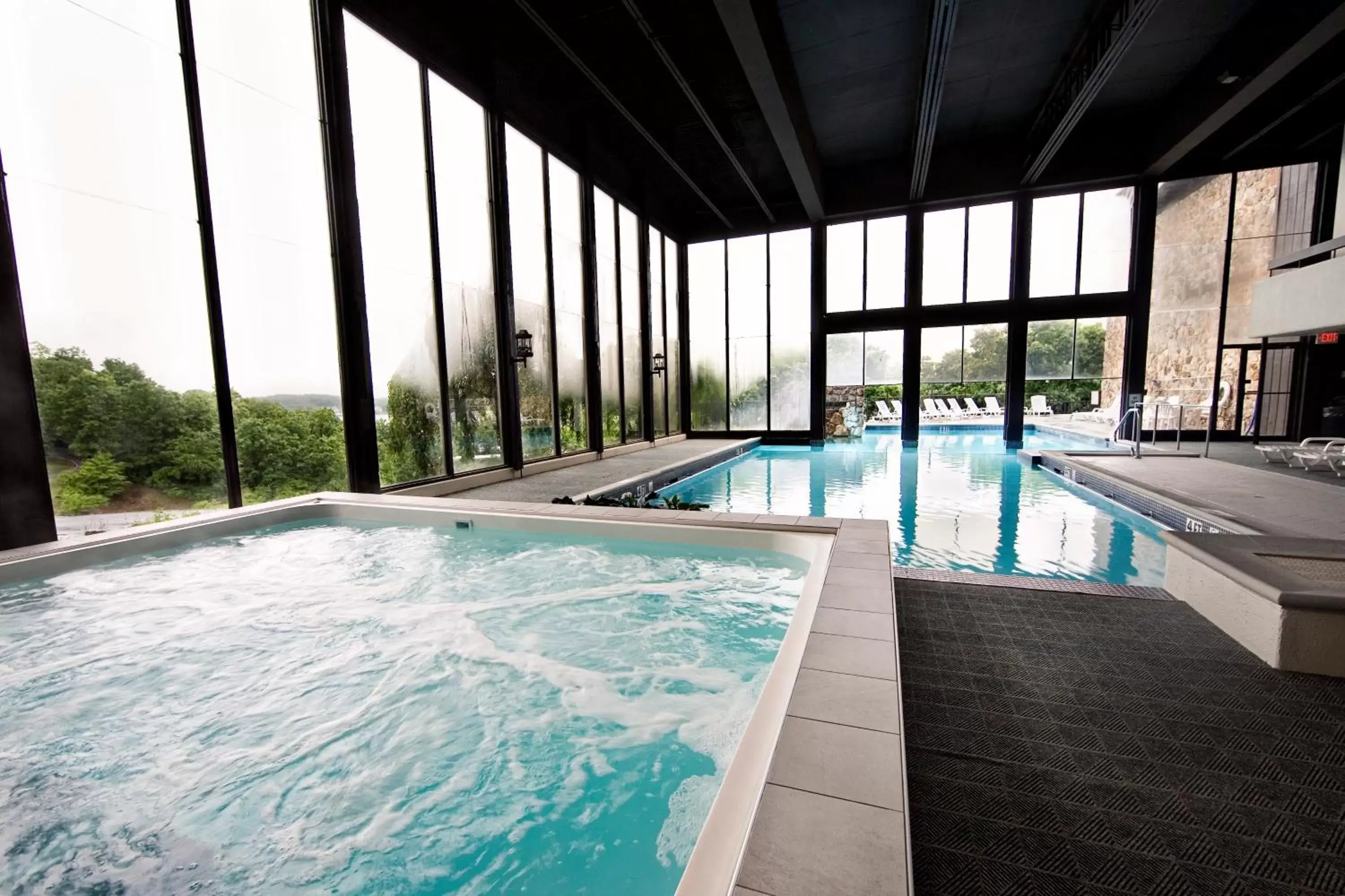 , Swimming Pool in Lodge of Four Seasons Golf Resort, Marina & Spa