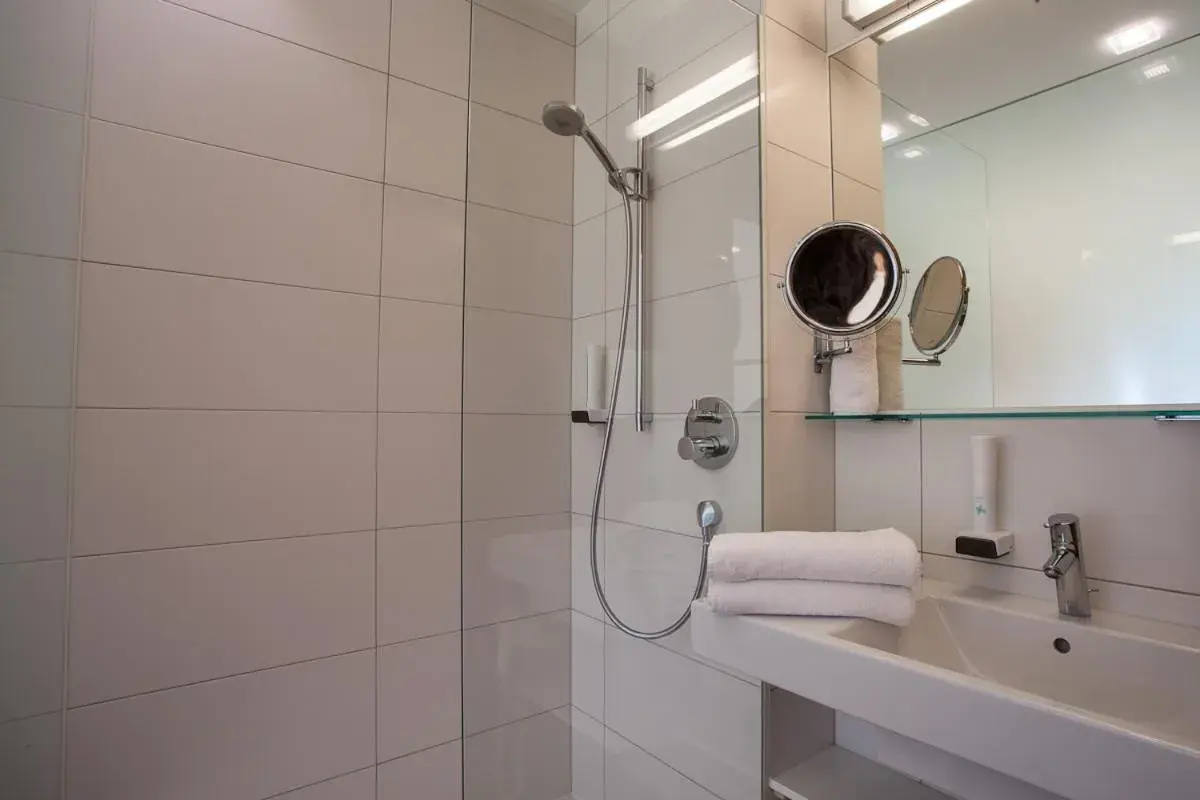 Bathroom in Hotel Wirtshaus Sattlerwirt