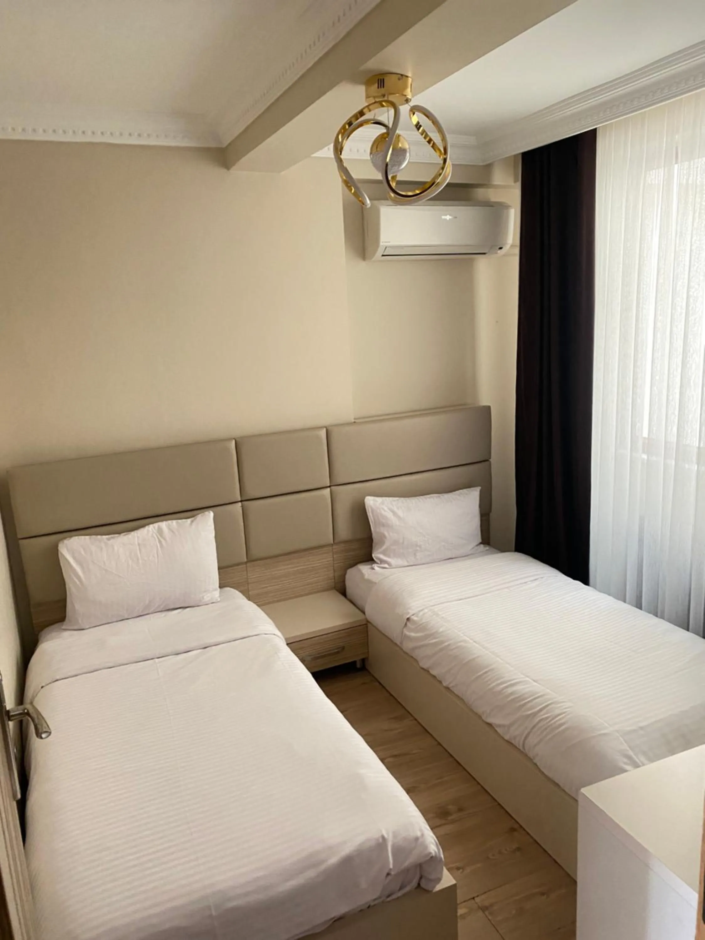 Bed in Overland Residence