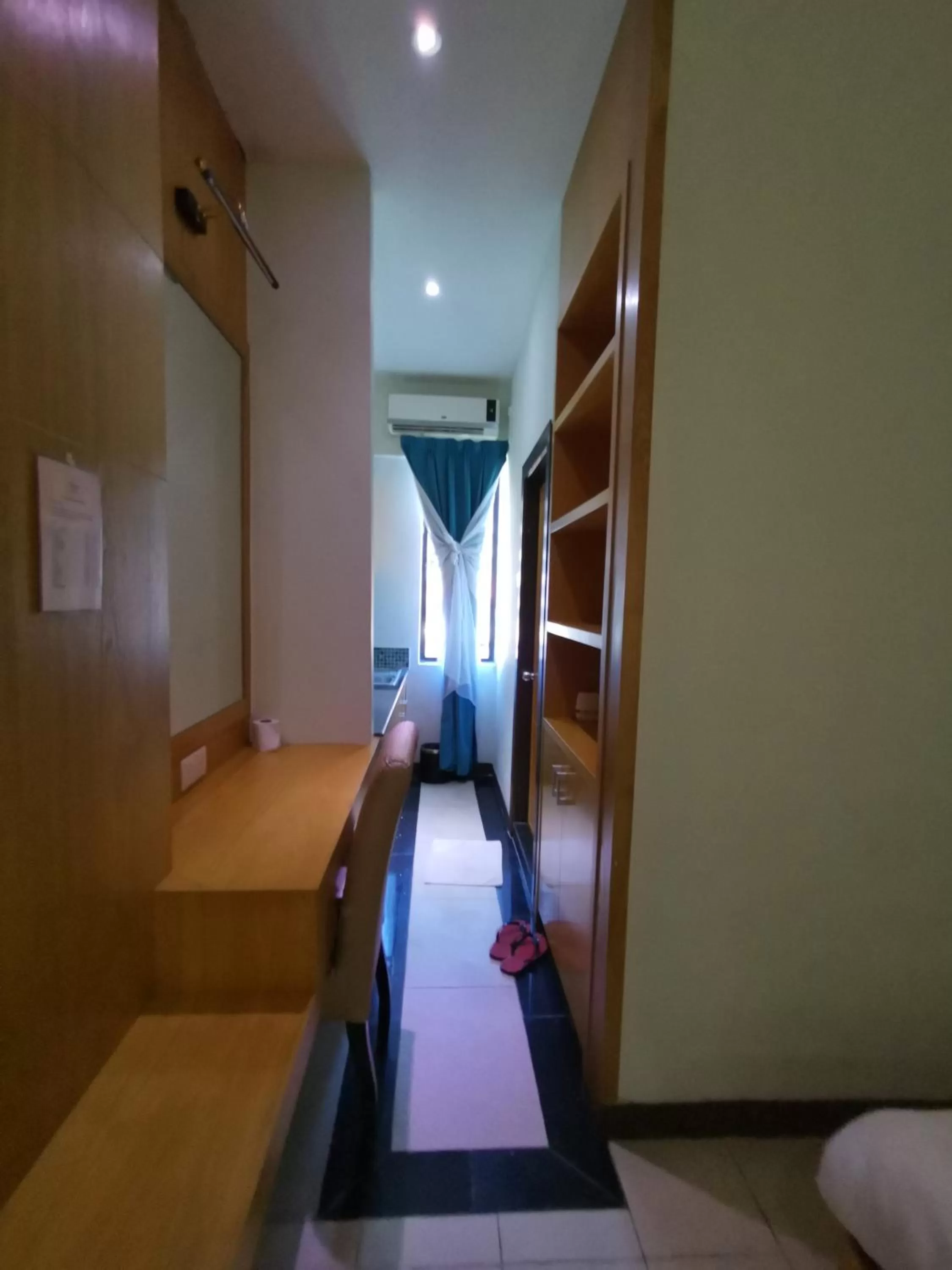 Photo of the whole room, Bed in Fratini's Hotel Labuan