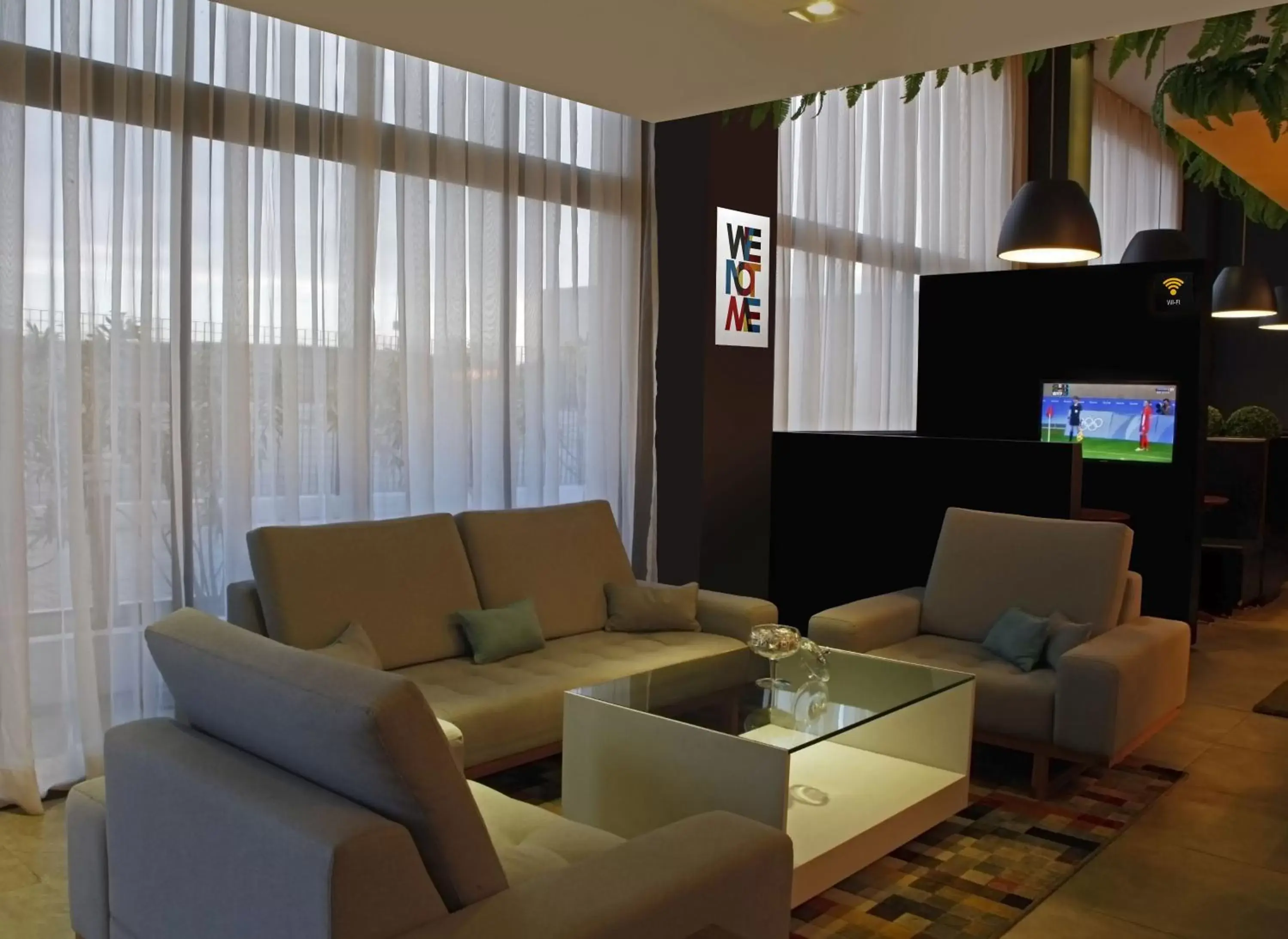 Communal lounge/ TV room, Seating Area in ibis Styles Alagoinhas