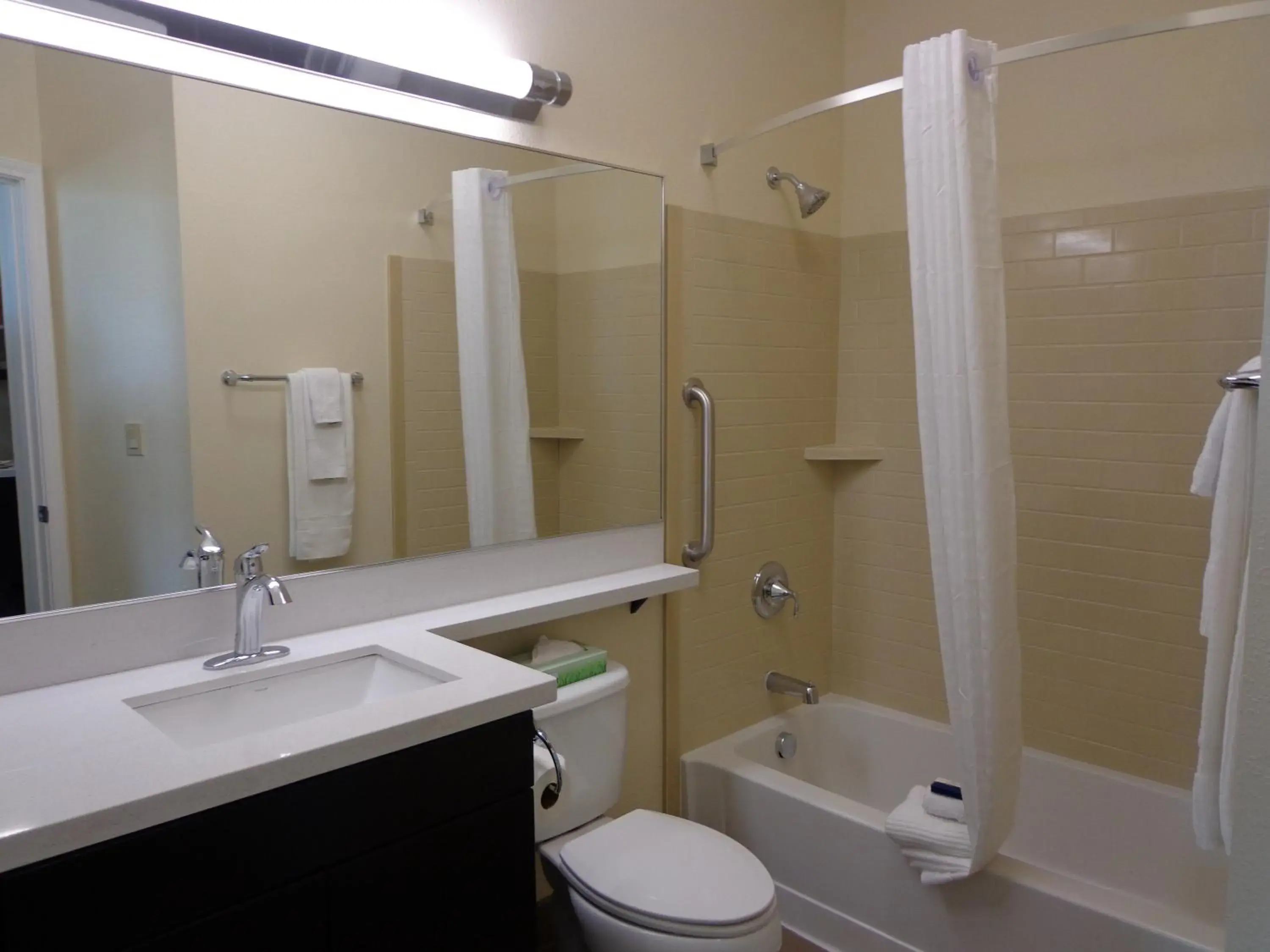 Bathroom in Candlewood Suites Odessa, an IHG Hotel