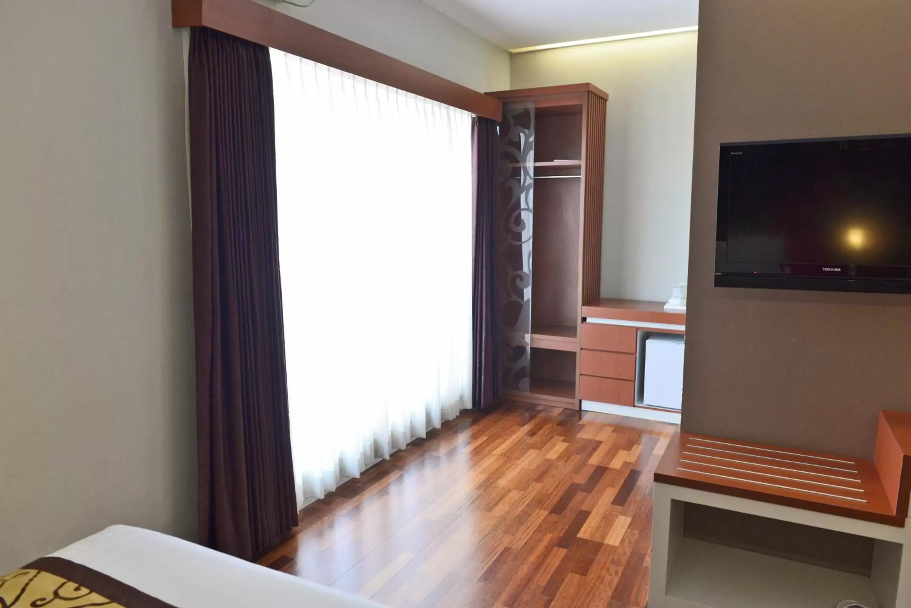 Bedroom, Seating Area in Hotel Trio Indah 2