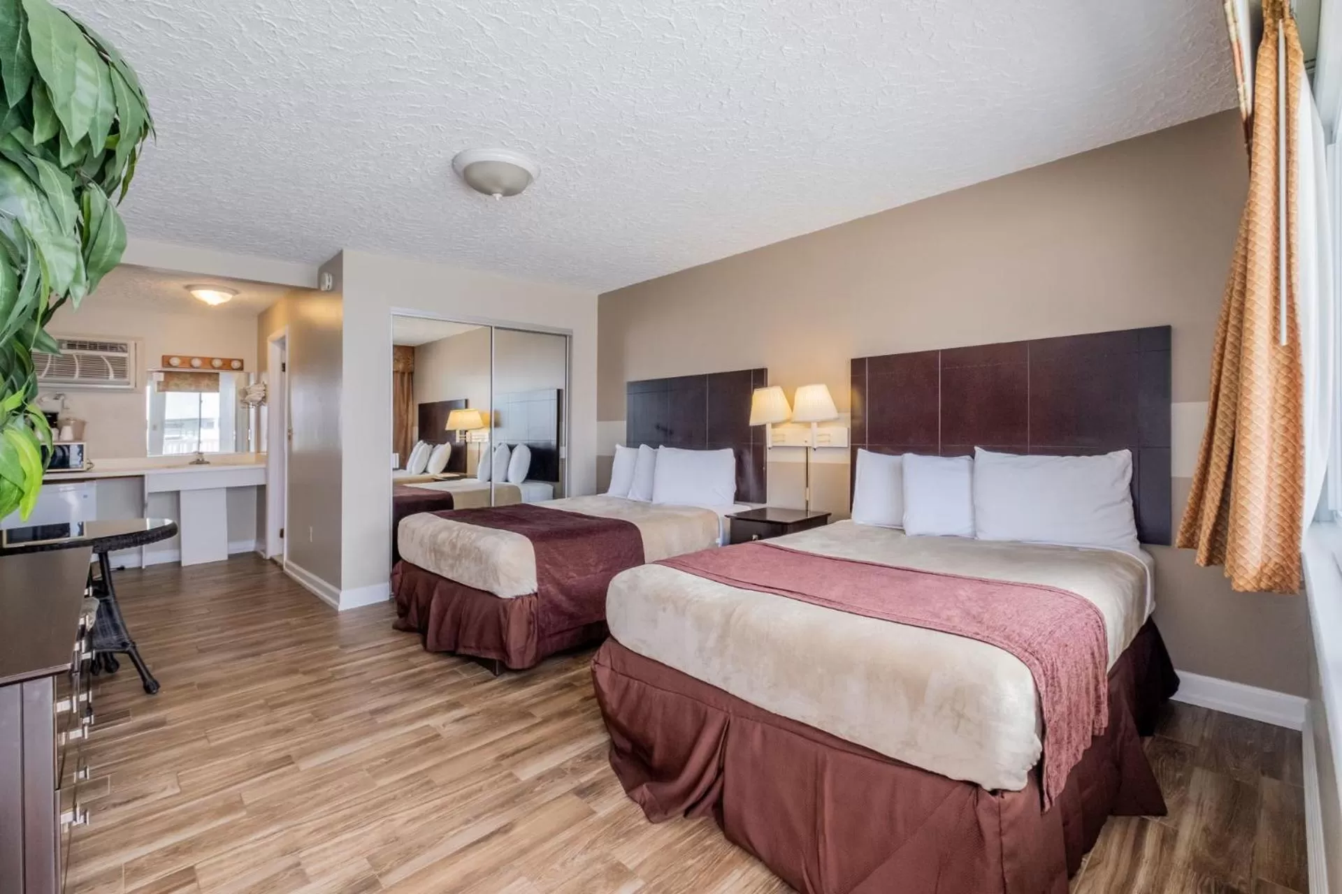 Bed in Heart of Wildwood Boardwalk Motel