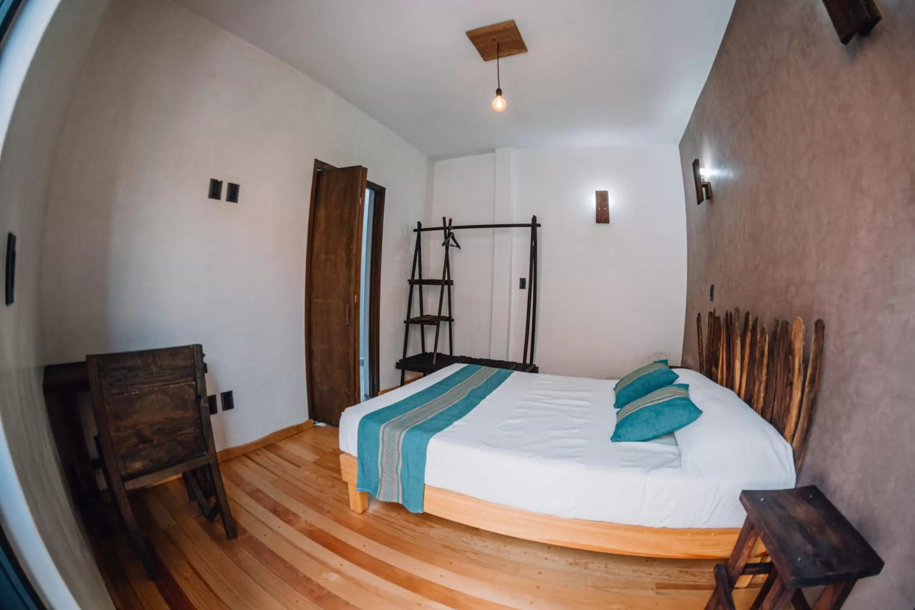 Photo of the whole room, Bed in Niyana Oaxaca
