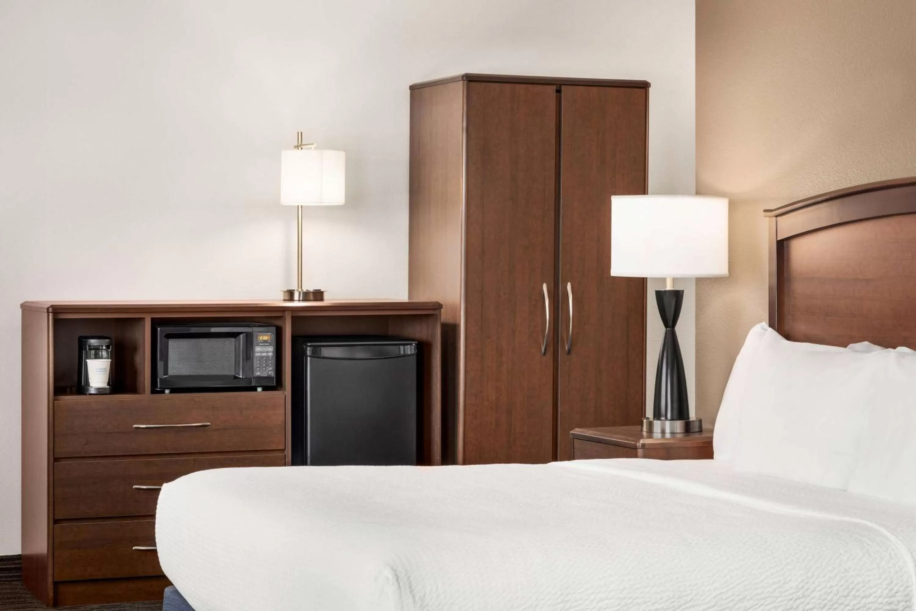 Bed in AmericInn by Wyndham Baudette