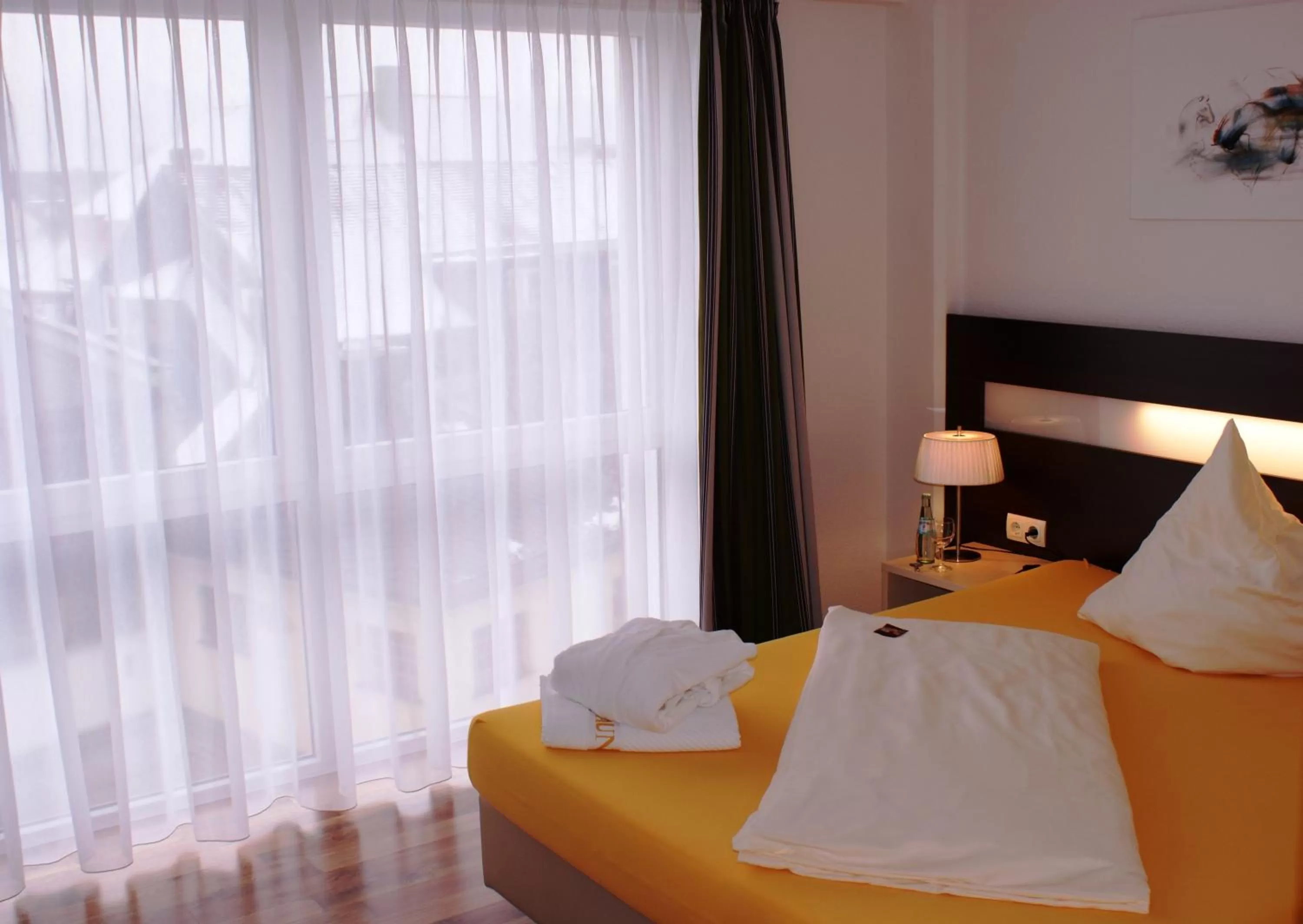 Bed in Hotel im Kornspeicher