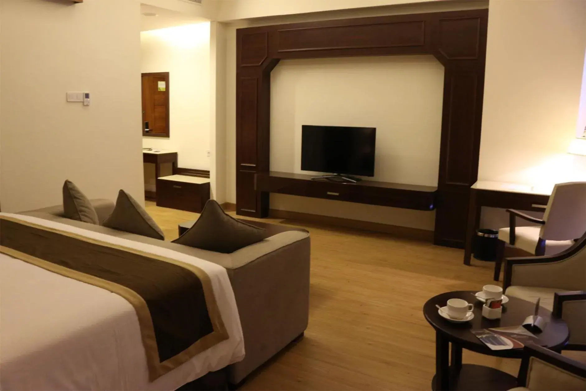 Photo of the whole room, TV/Entertainment Center in Java Palace Hotel