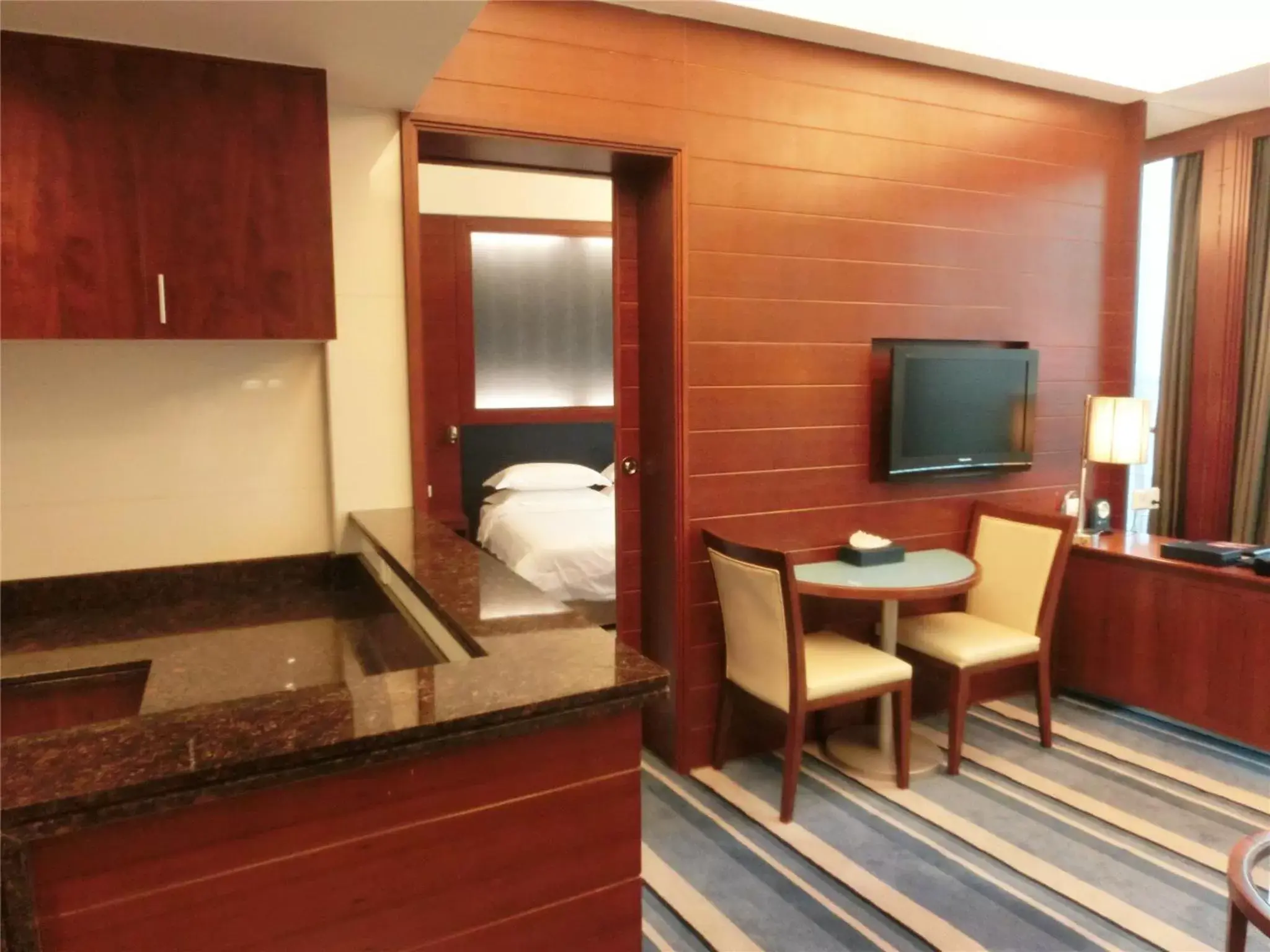 Photo of the whole room, TV/Entertainment Center in Ocean Hotel