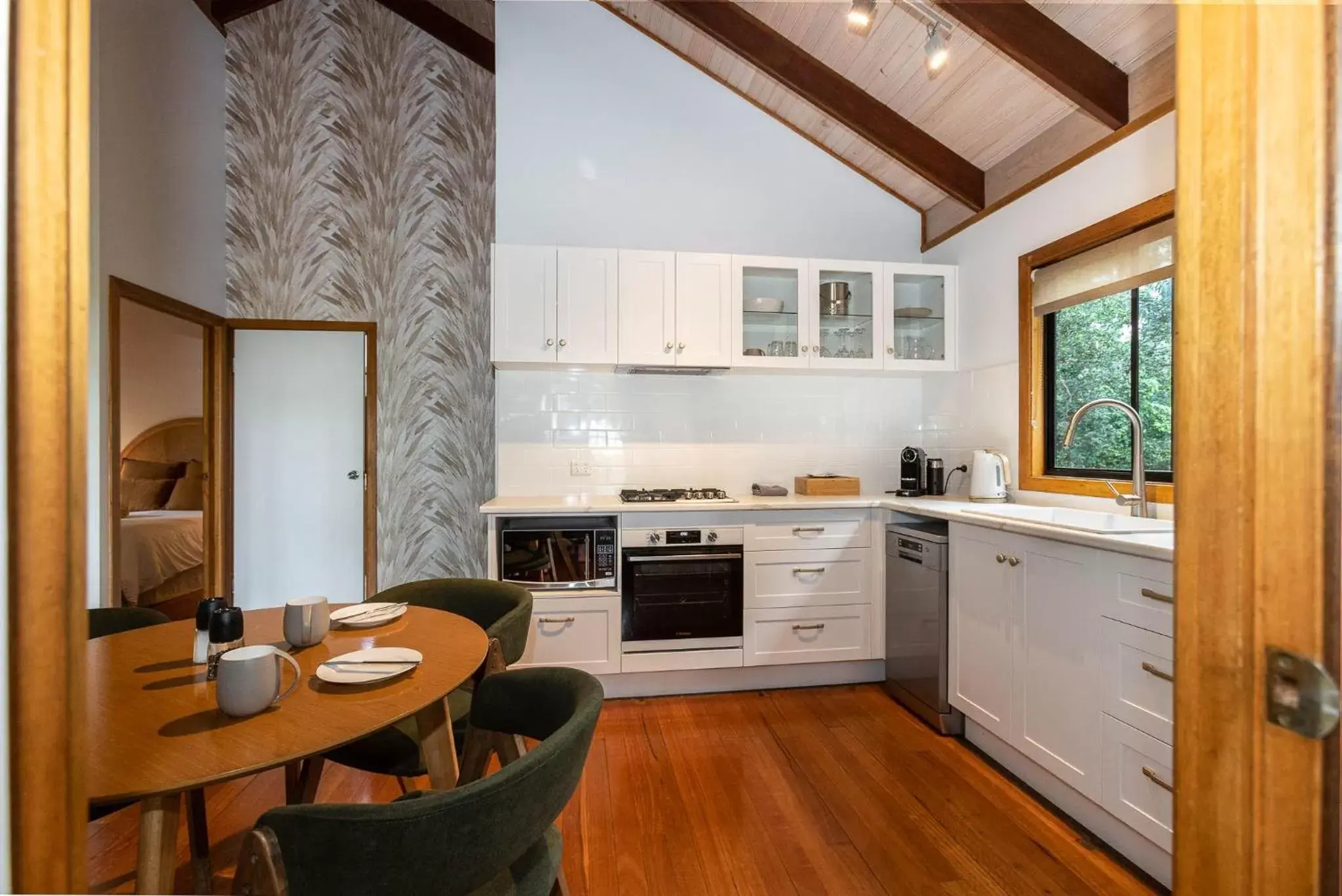 Kitchen/Kitchenette in Lake Weyba Cottages Noosa