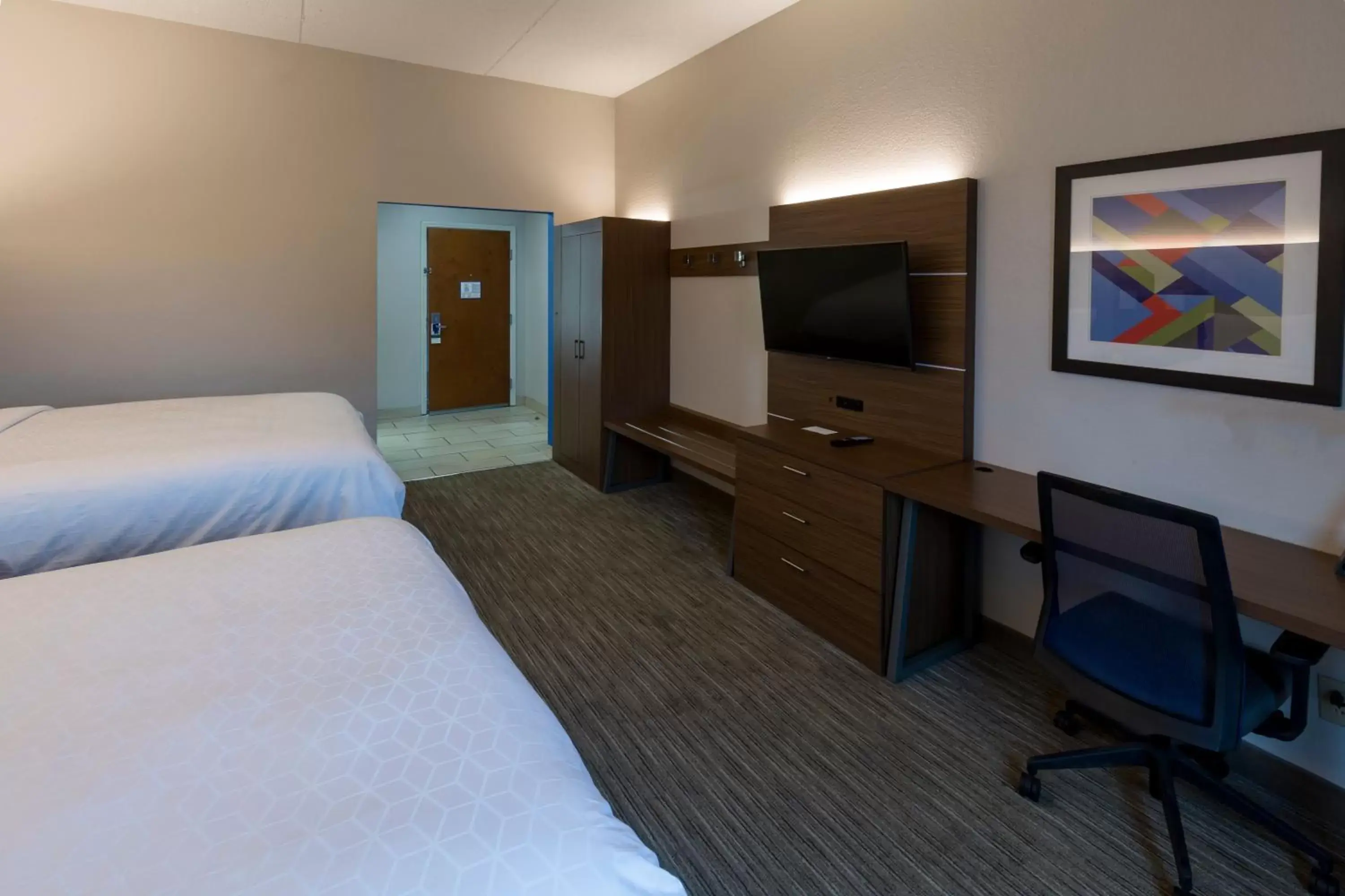 Photo of the whole room, TV/Entertainment Center in Holiday Inn Express Hotel & Suites Louisville South-Hillview, an IHG Hotel