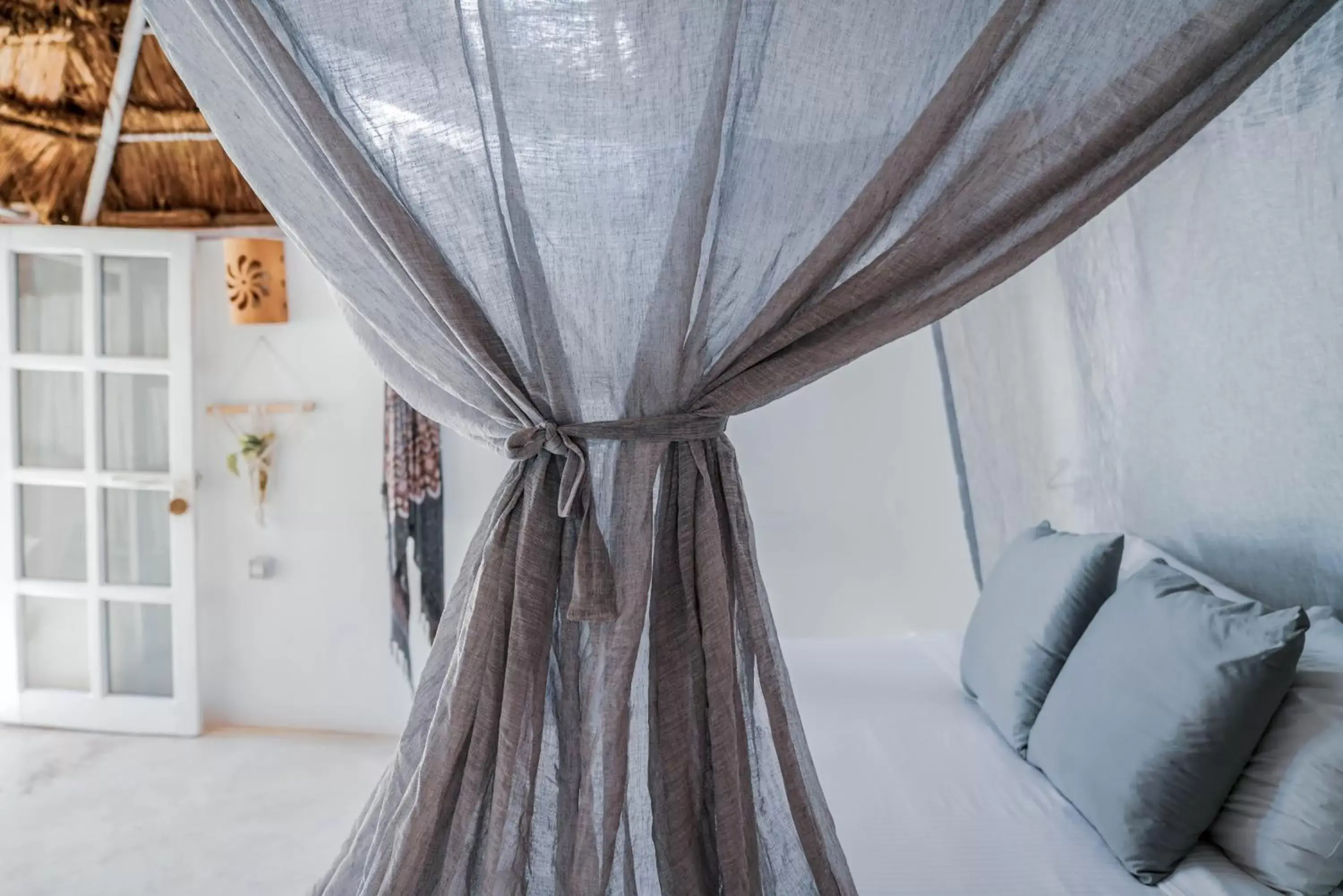 Bed in Coco Tulum Beach Club Hotel