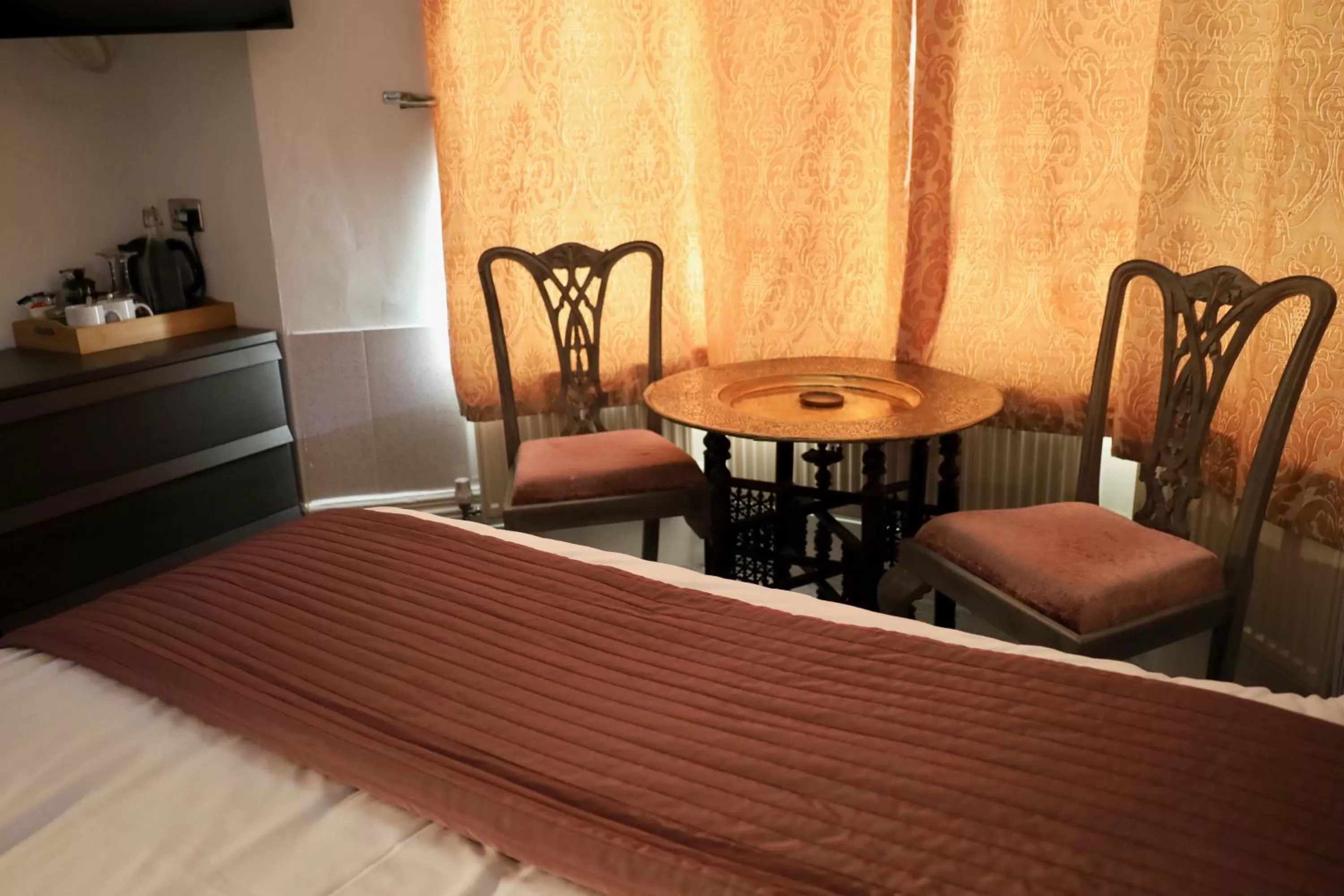 Seating area in Brighton Inn Boutique Guest Accommodation