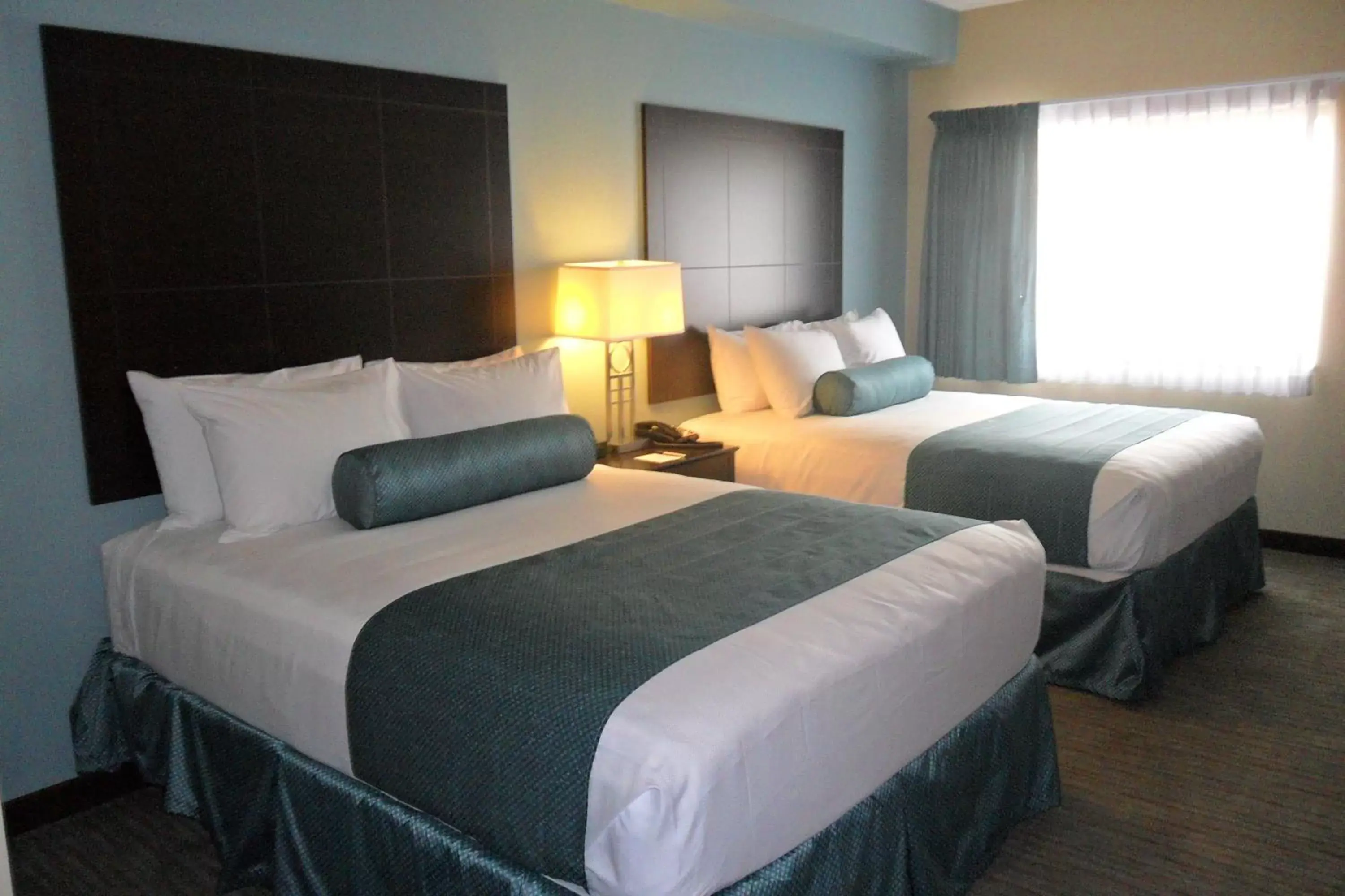 Bedroom, Bed in Cobblestone Inn & Suites - Fort Dodge