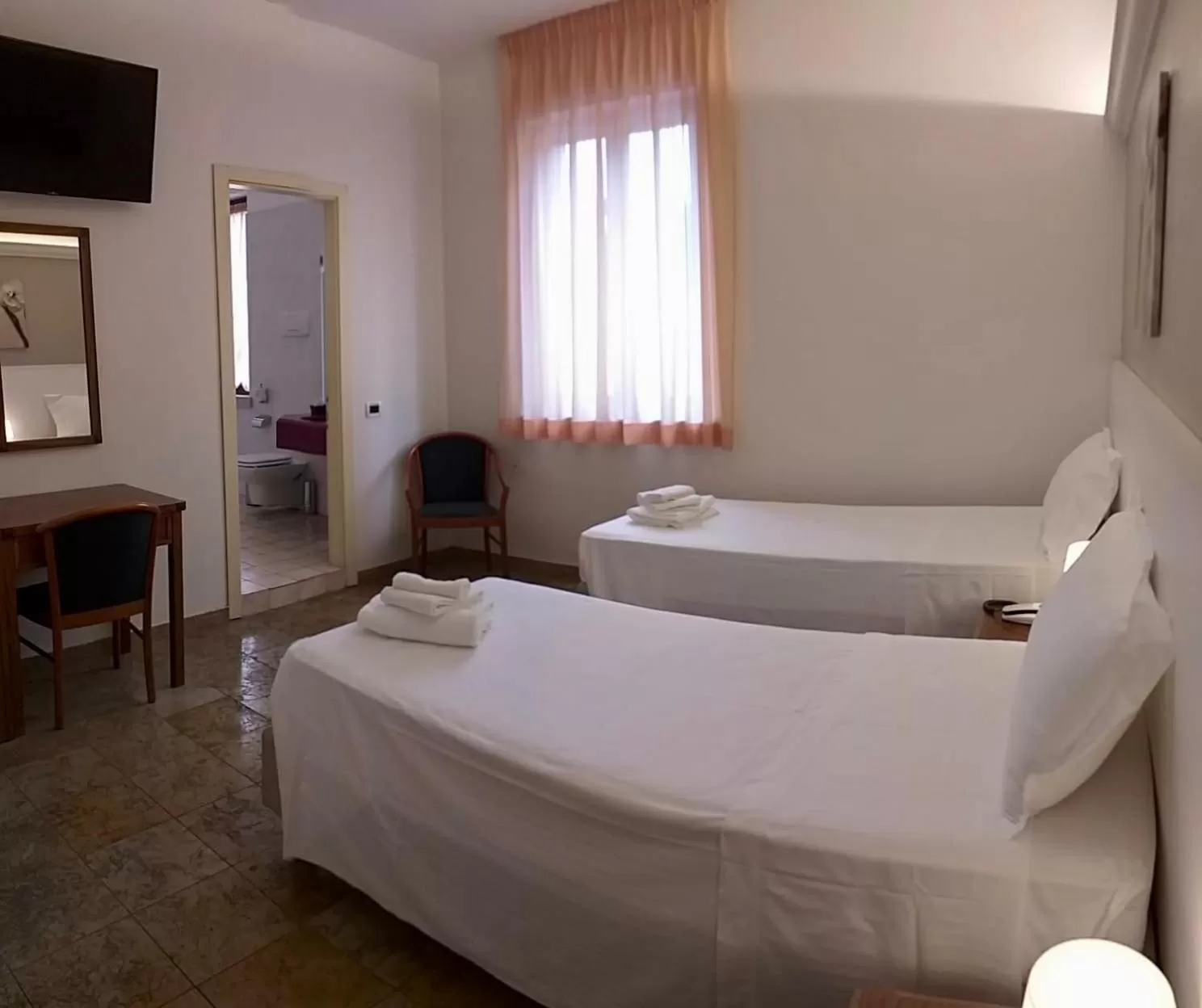 Bed in Hotel Elefante