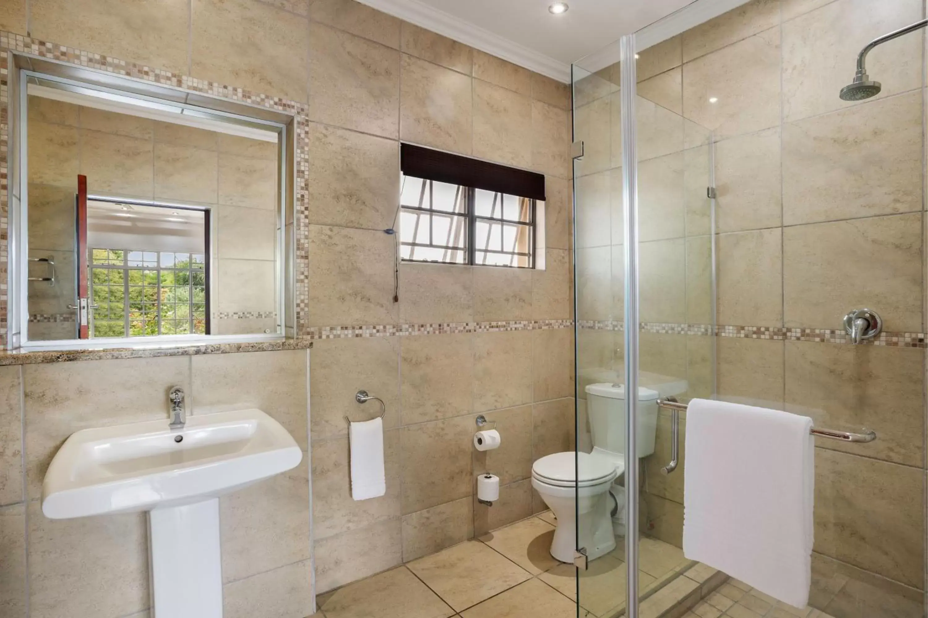 Bathroom in Protea Hotel by Marriott Polokwane Ranch Resort