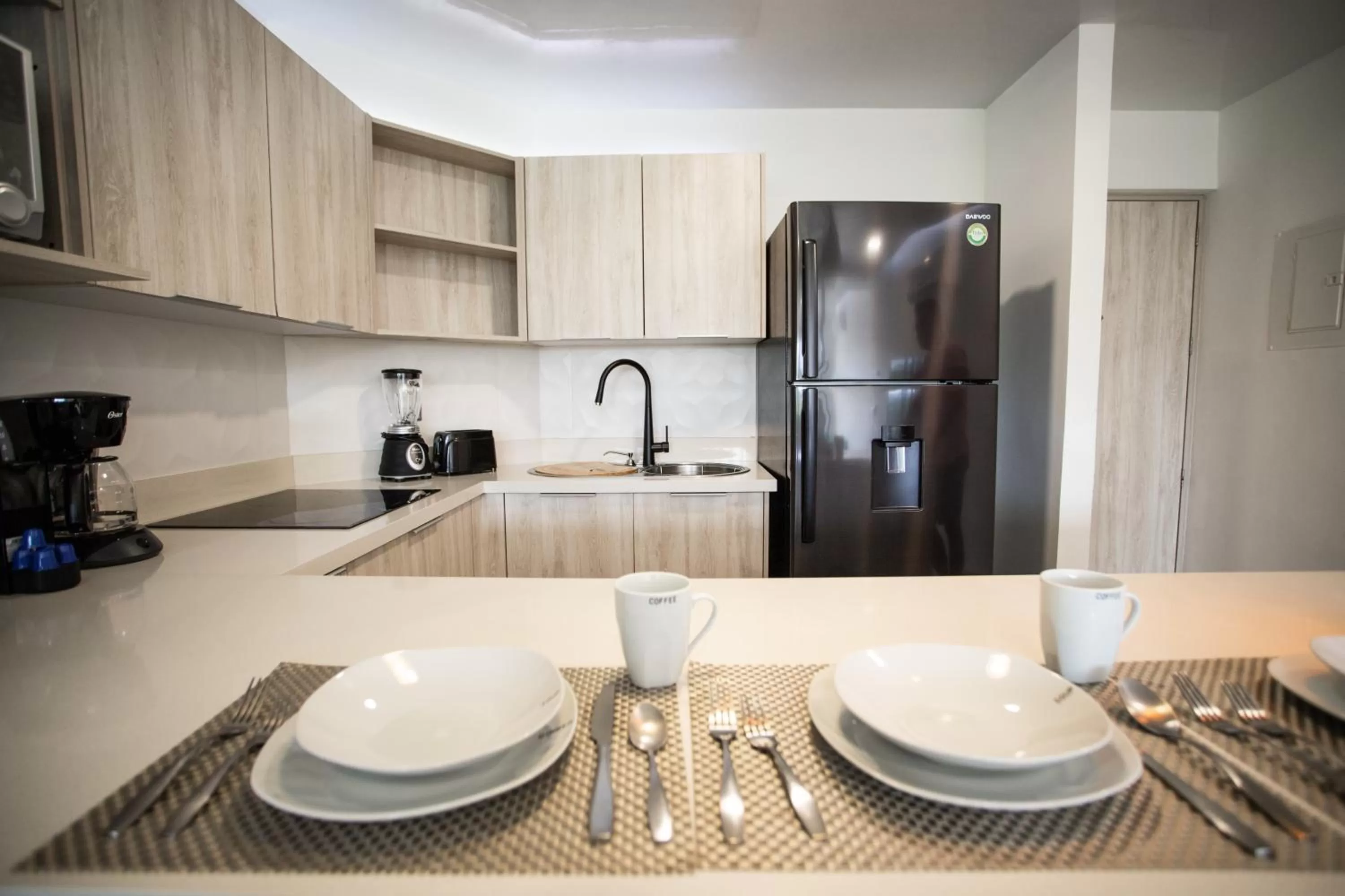 Kitchen or kitchenette in Macondo Quinta Avenida Residences