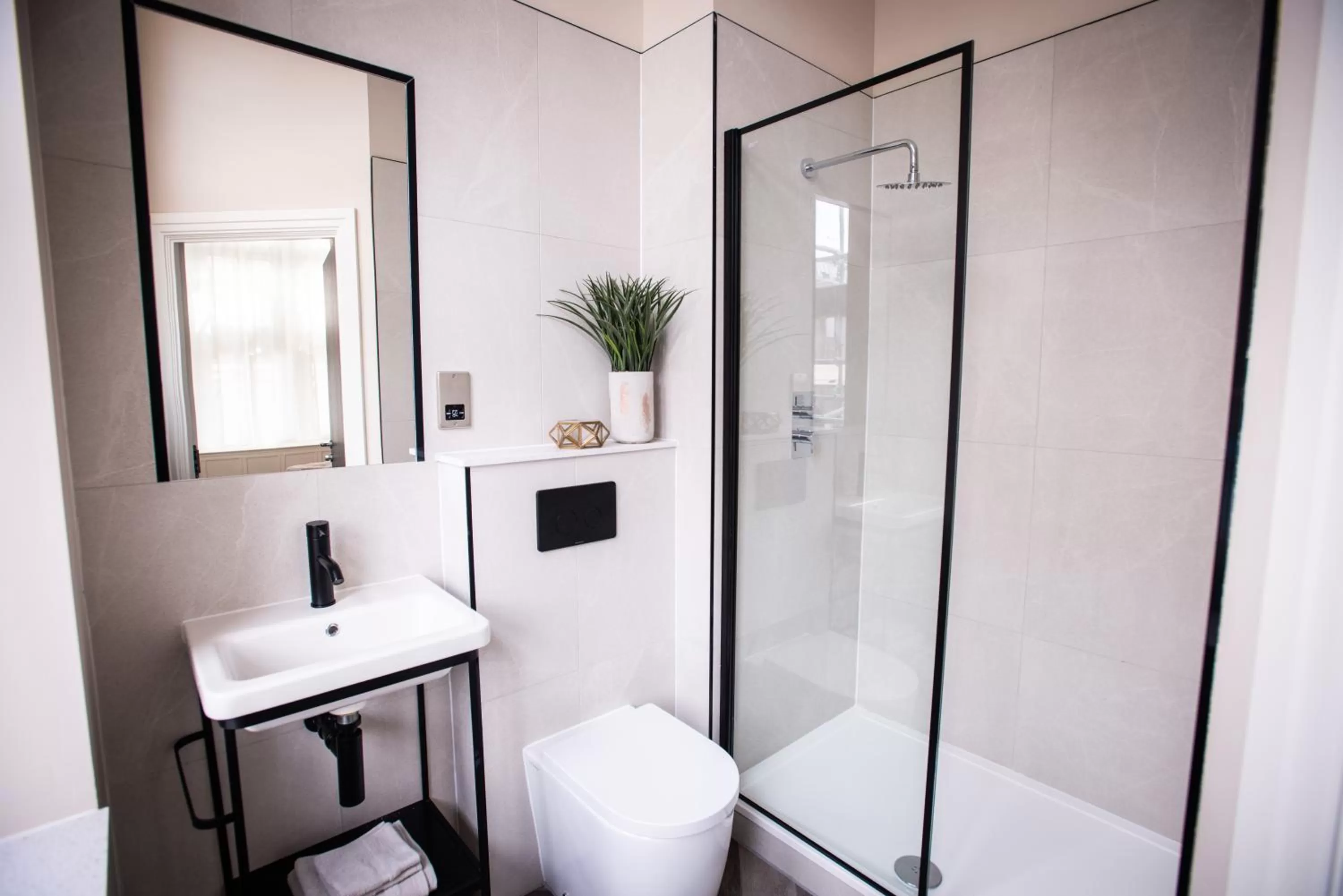 Bathroom in The Gresham Aparthotel