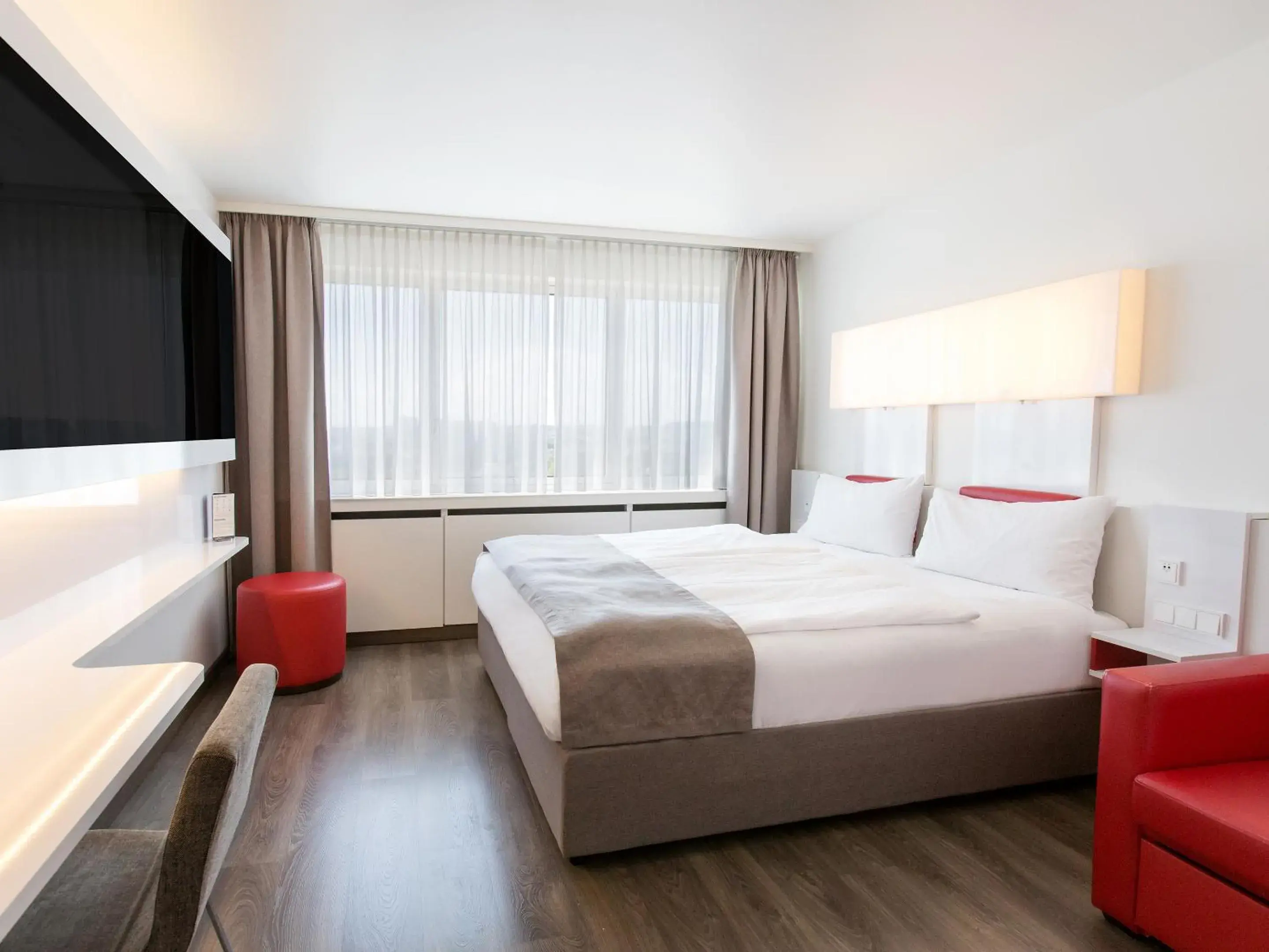 Photo of the whole room, Bed in DORMERO Hotel Stuttgart Photo of the whole room, Bed in DORMERO Hotel Stuttgart