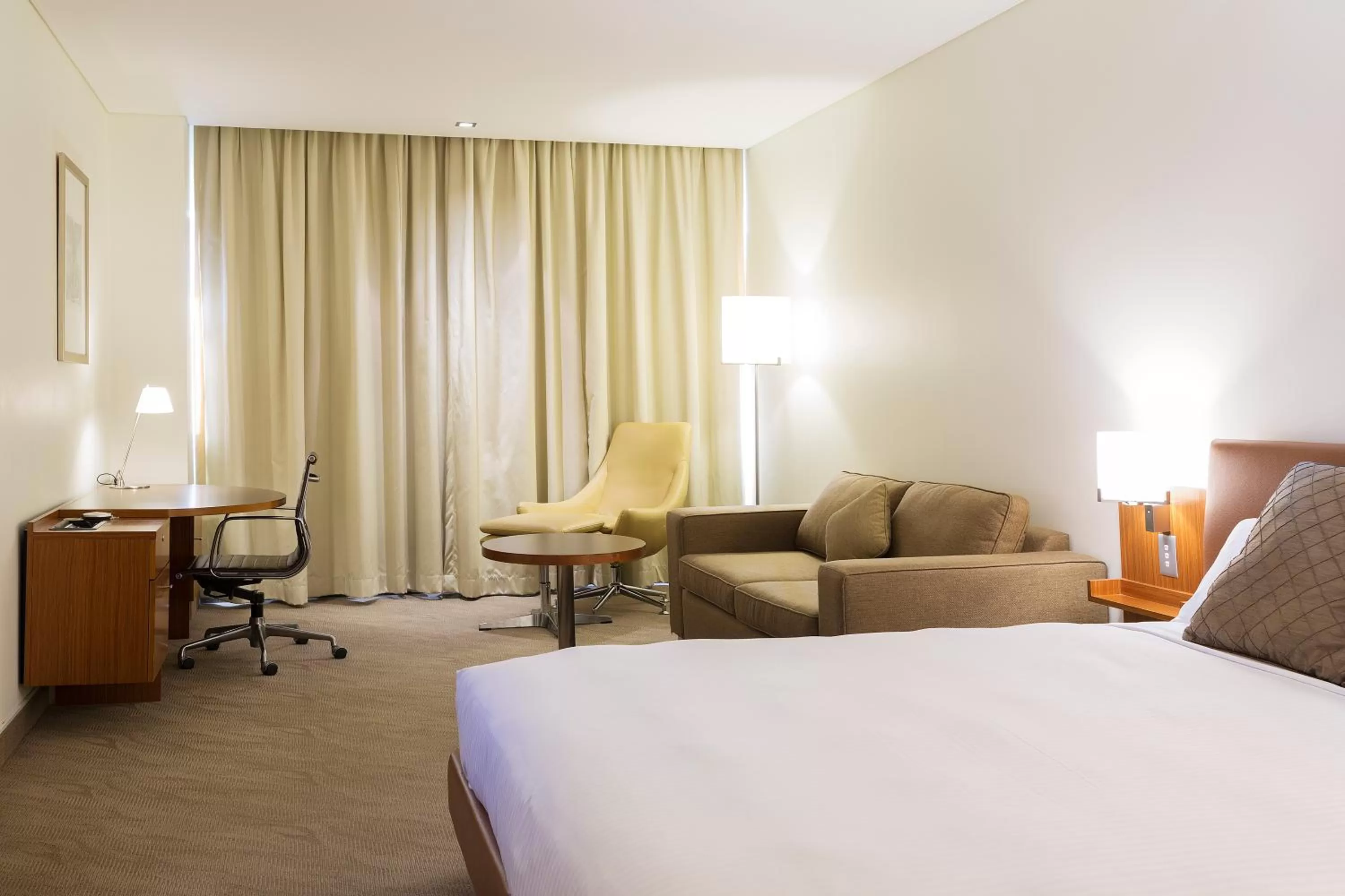 Photo of the whole room, Bed in Novotel Canberra