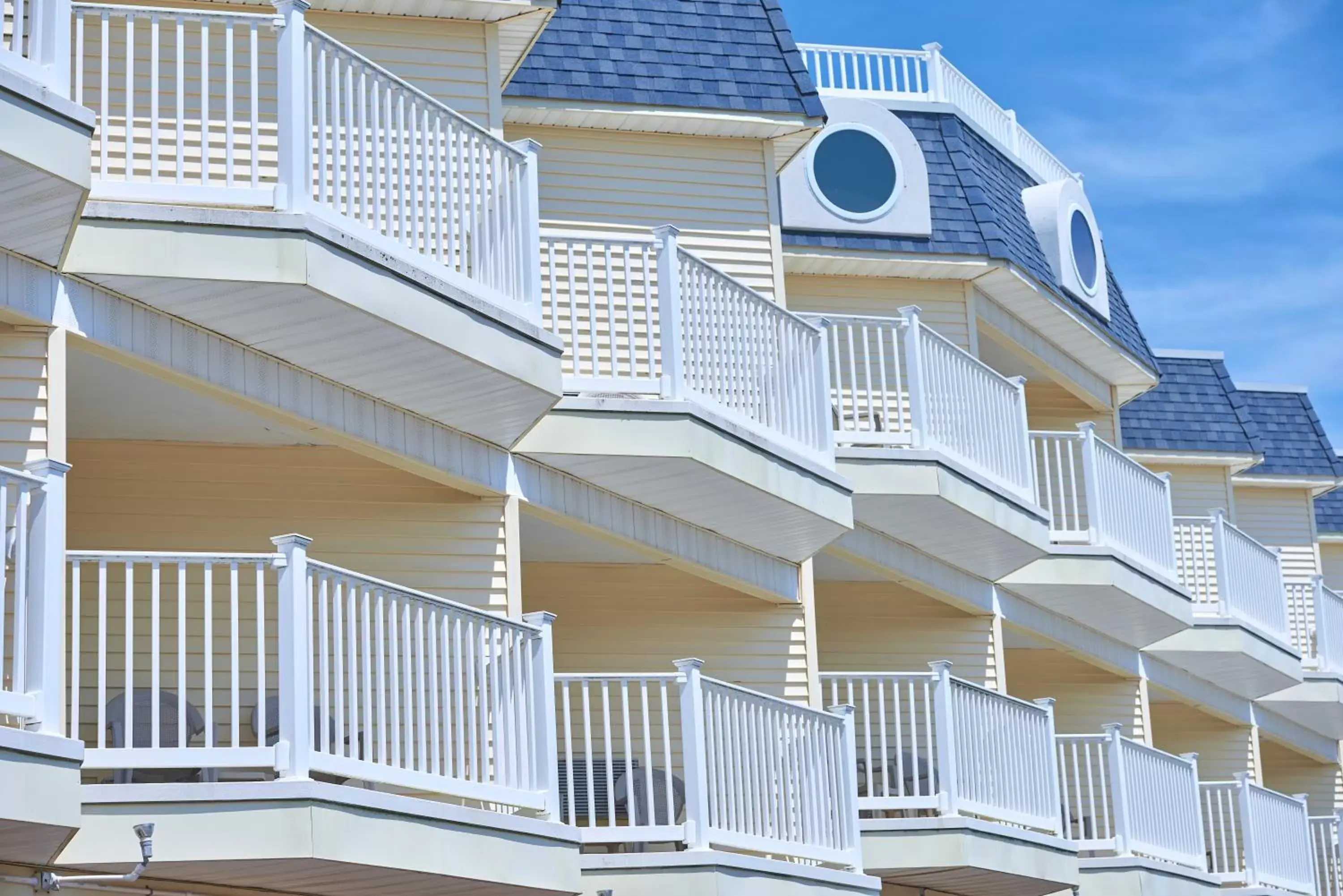 Patio, Property Building in Drifting Sands Oceanfront Hotel