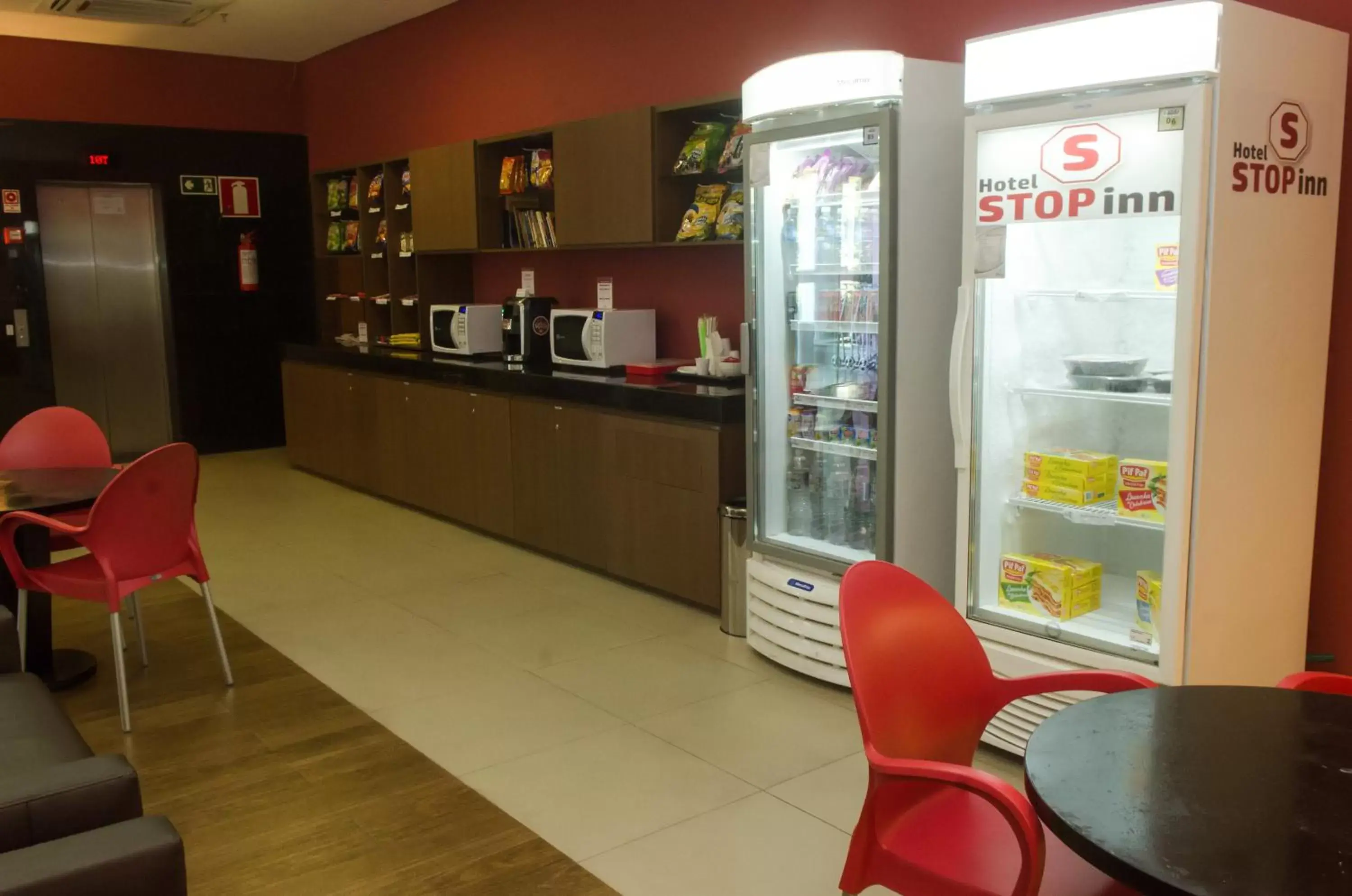 Lounge or bar in Stop Inn Antonio Carlos Lounge or bar in Stop Inn Antonio Carlos