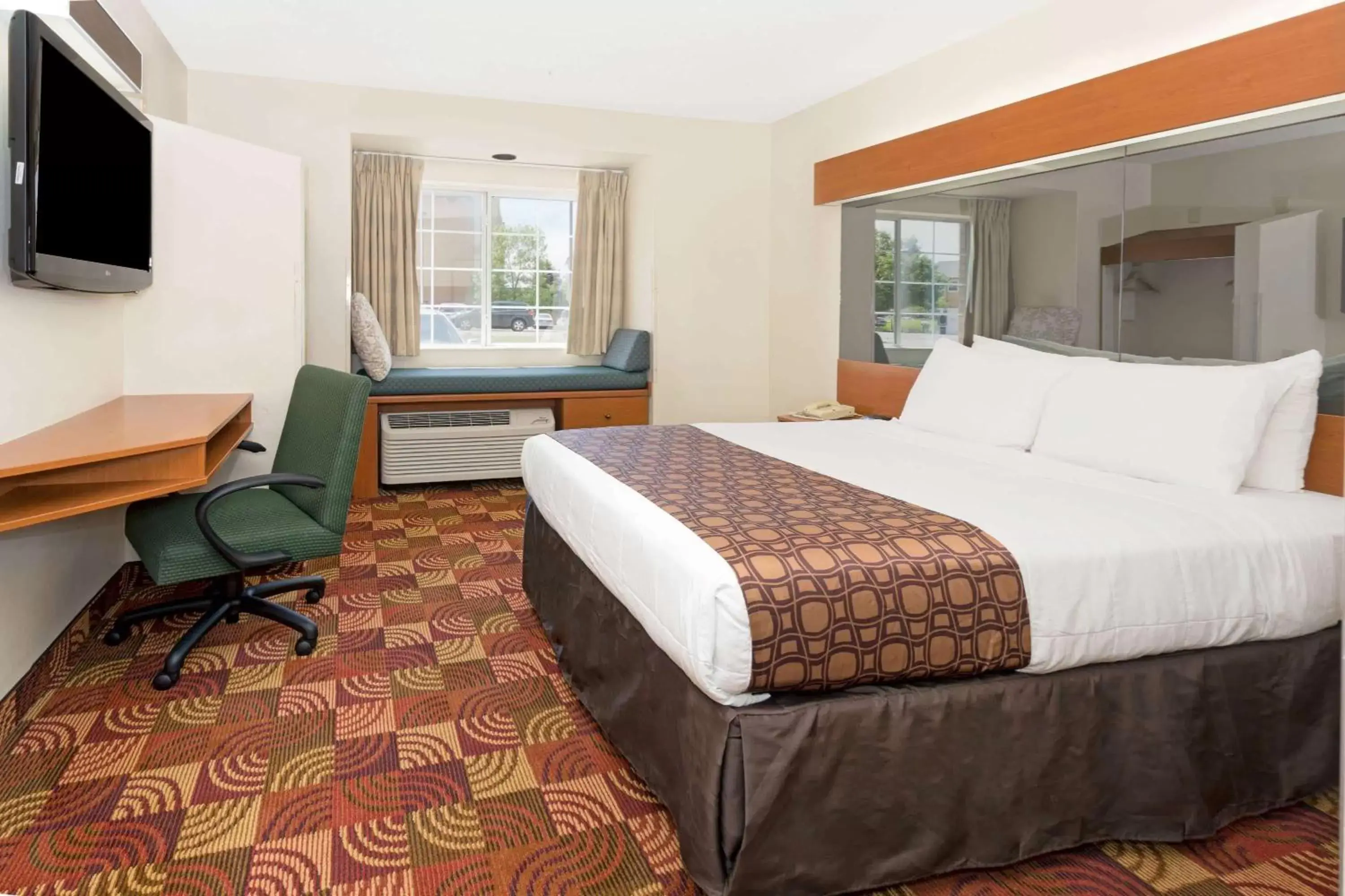 Photo of the whole room, Bed in Microtel Inn & Suites by Wyndham Denver Airport