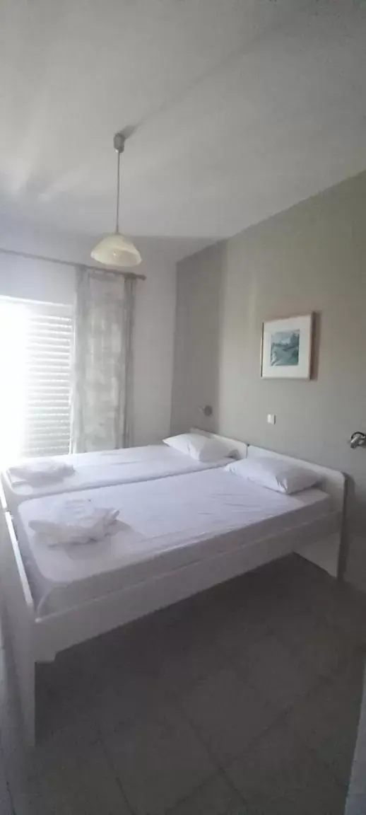 Twin Room with Sea View - single occupancy in Nikolaki Rooms Twin Room with Sea View - single occupancy in Nikolaki Rooms