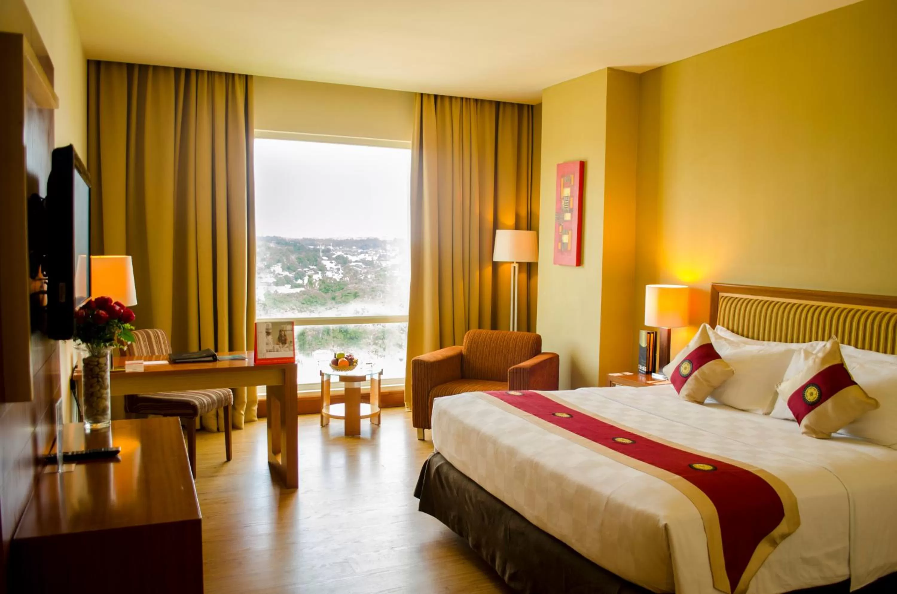 Bed in Swiss-Belhotel Maleosan Manado