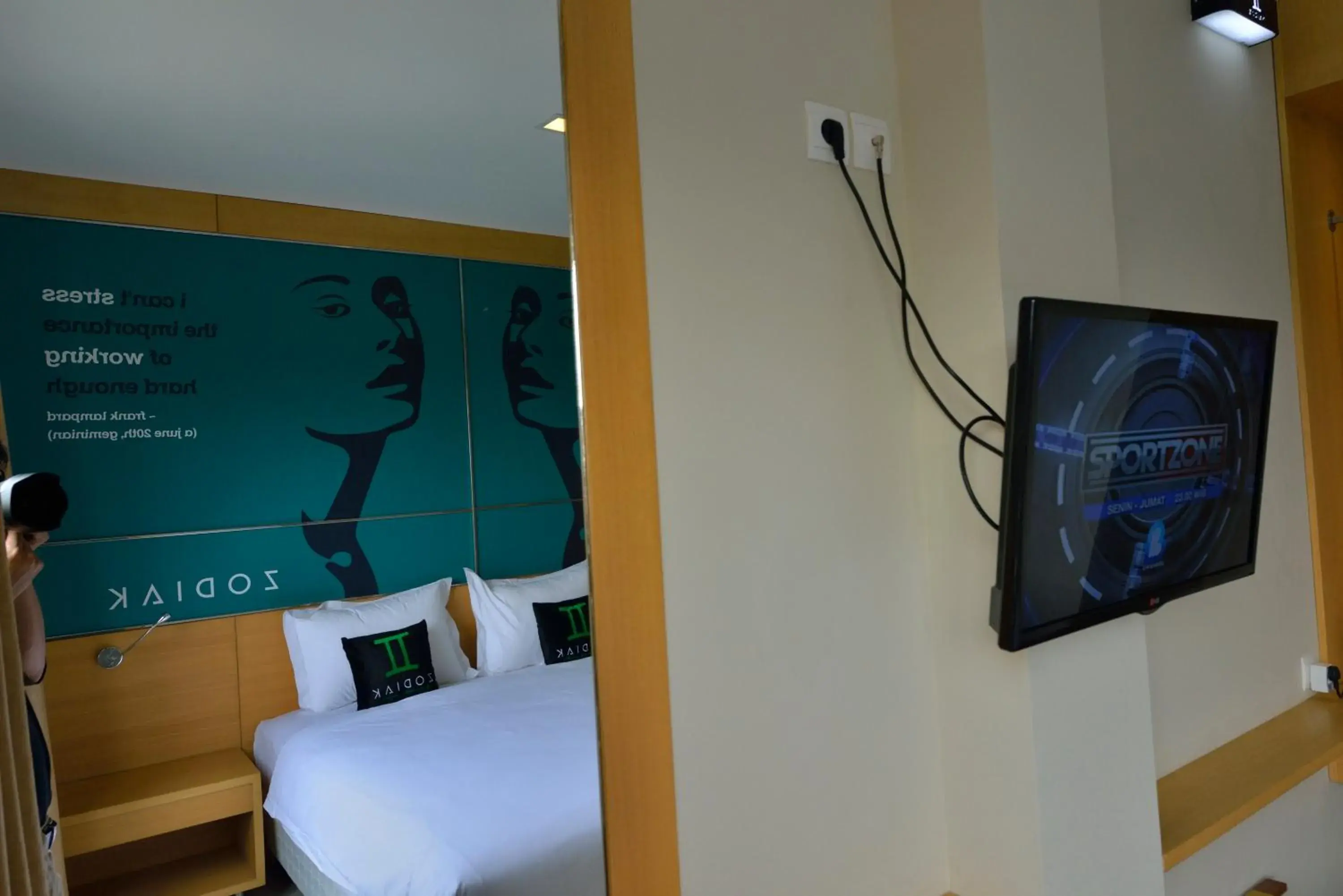 TV and multimedia, TV/Entertainment Center in Zodiak MT Haryono by KAGUM Hotels