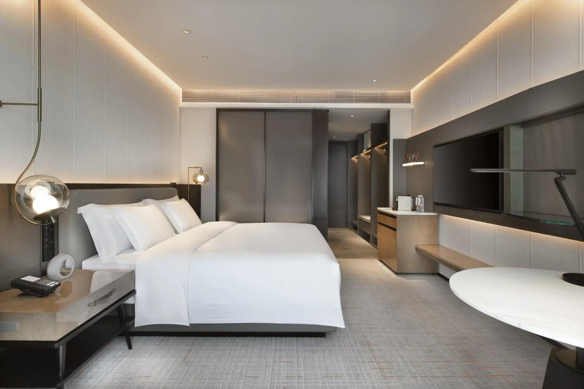 Photo of the whole room, Bed in Crowne Plaza Wuhan Optics Valley, an IHG Hotel